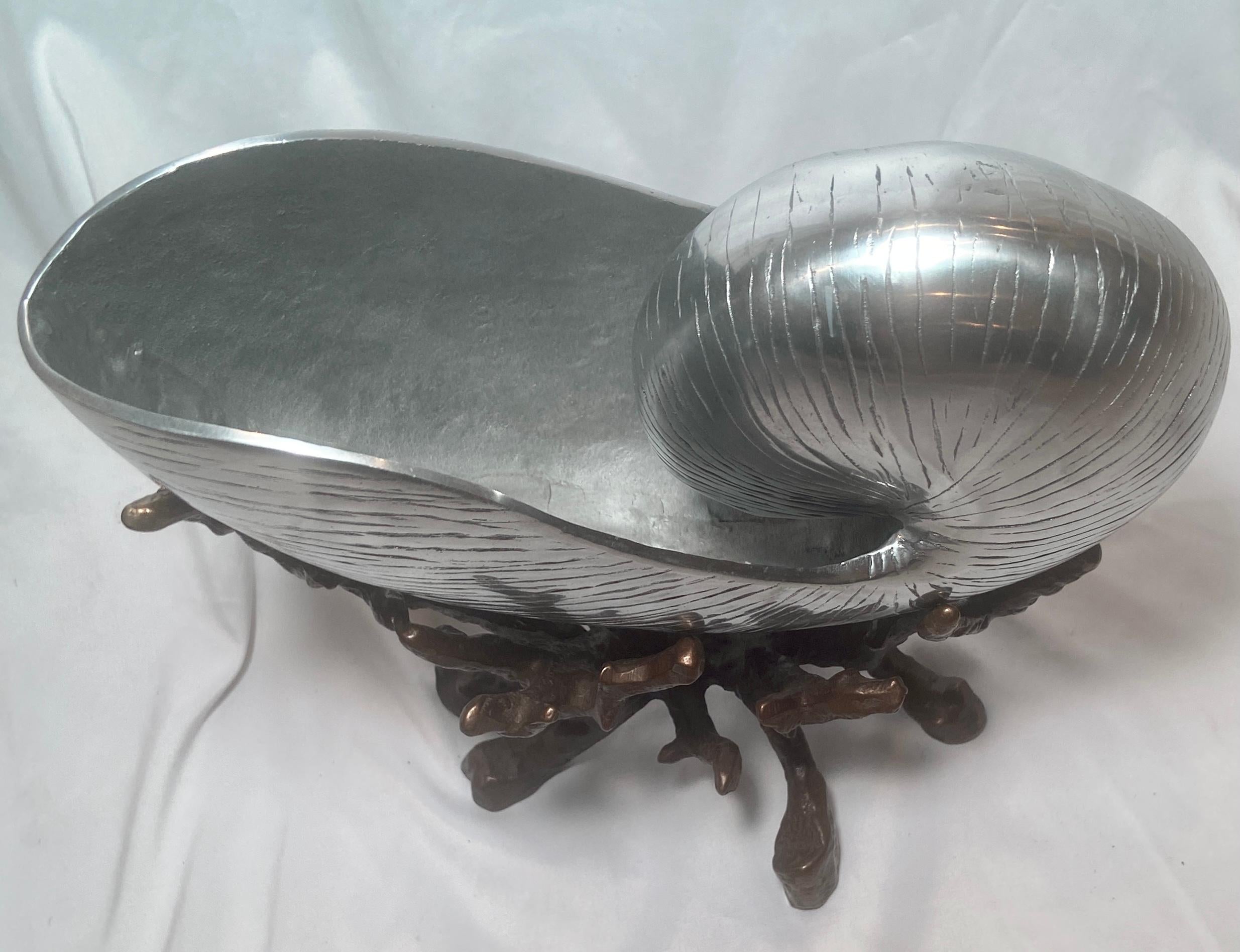 Antique Japanese Aesthetic Movement silvered bronze Nautilus sea shell on bronze coral stand.