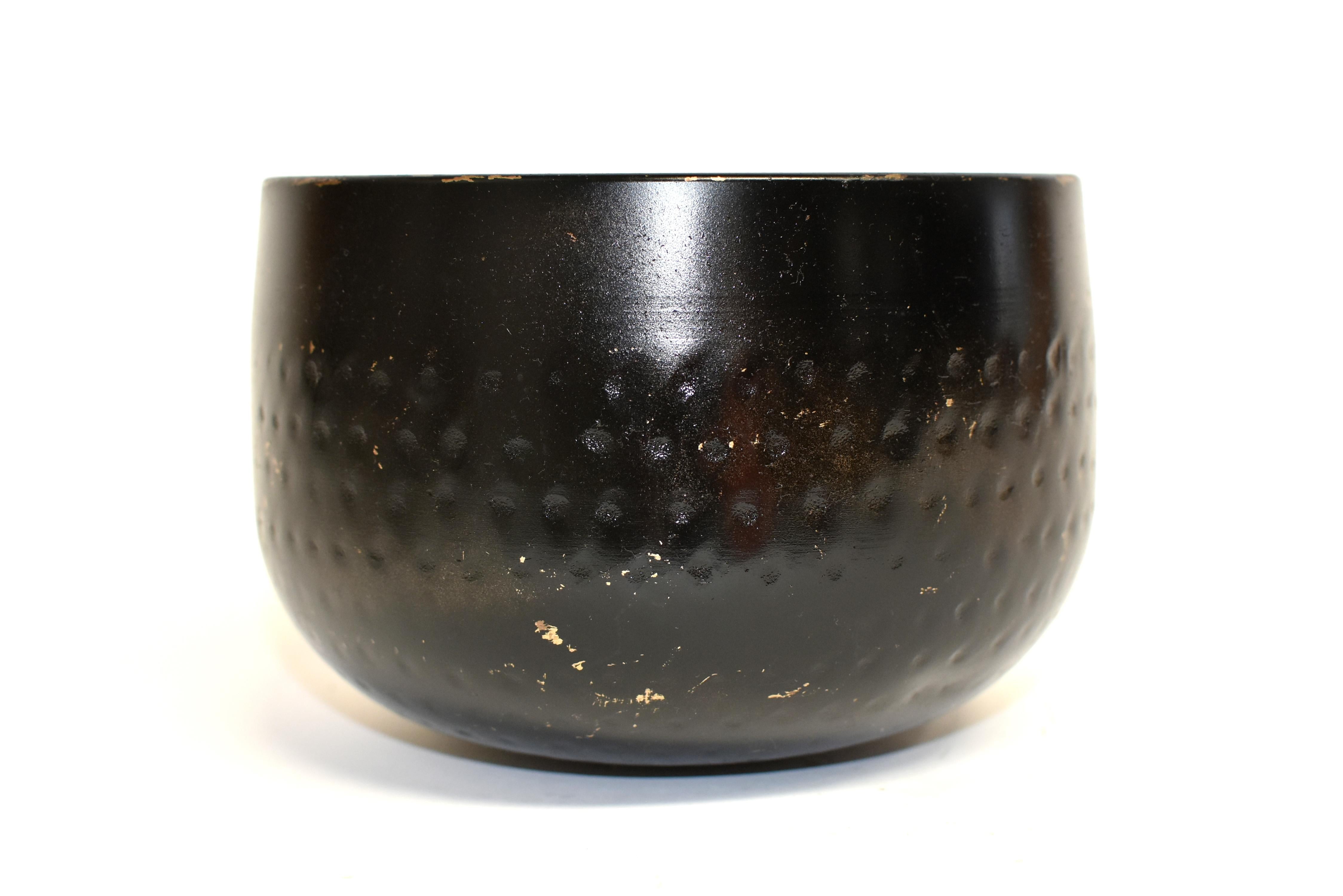 A beautiful singing bowl made of solid bronze with hand-hammered dot pattern. This bowl makes a beautiful, enlightening sound that is at once soothing and thought provoking. Such a bowl was used in the Japanese temple to sync energy between human