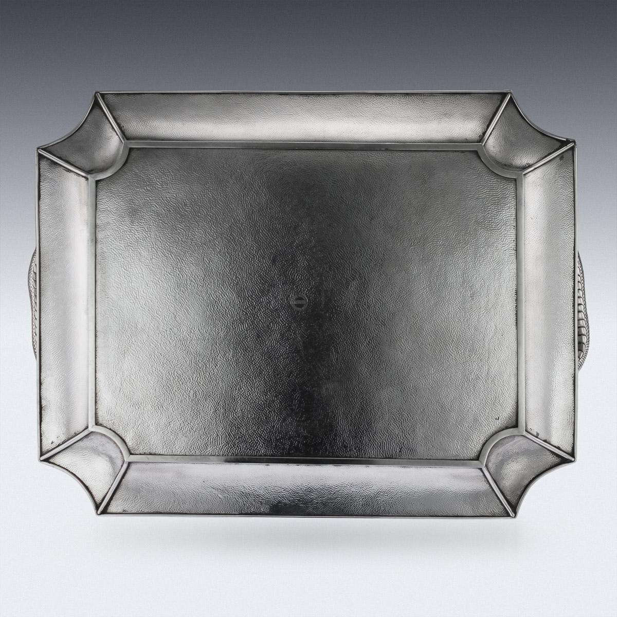 Antique early 20th century Japanese solid silver impressive tea tray, exceptional and magnificent quality, double walled, chased, embossed and applied with a water dragons in high relief, with dragon-form handles emerging from water and flowing