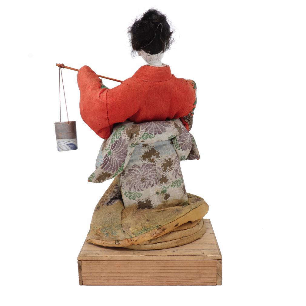 Hand-Crafted Antique Japanese Takeda Ningyo, Depicting Murasame Carrying a Shiokumi For Sale