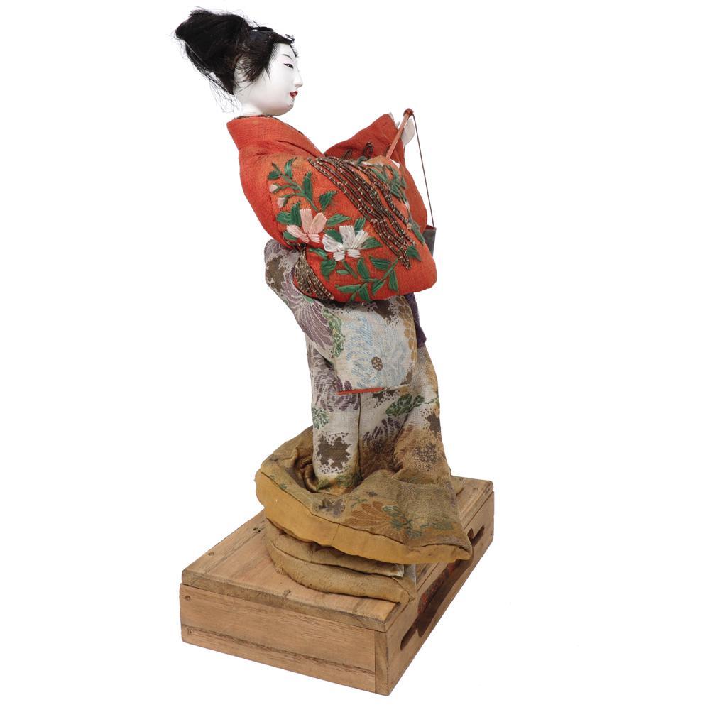 Mid-19th Century Antique Japanese Takeda Ningyo, Depicting Murasame Carrying a Shiokumi For Sale