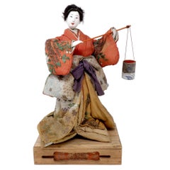 Antique Japanese Takeda Ningyo, Depicting Murasame Carrying a Shiokumi