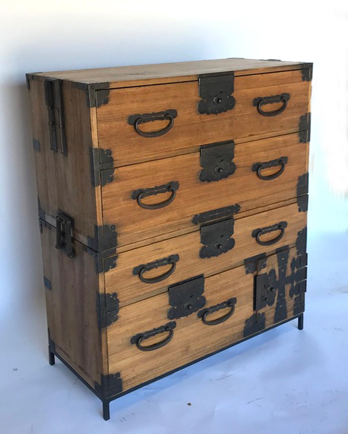 Very functional, hinoki wood Japanese tansu on custom iron base. This tansu has four drawers and one small compartment with two small drawers. All original. Works as a chest of drawers or can be separated and used as nightstands or side tables.