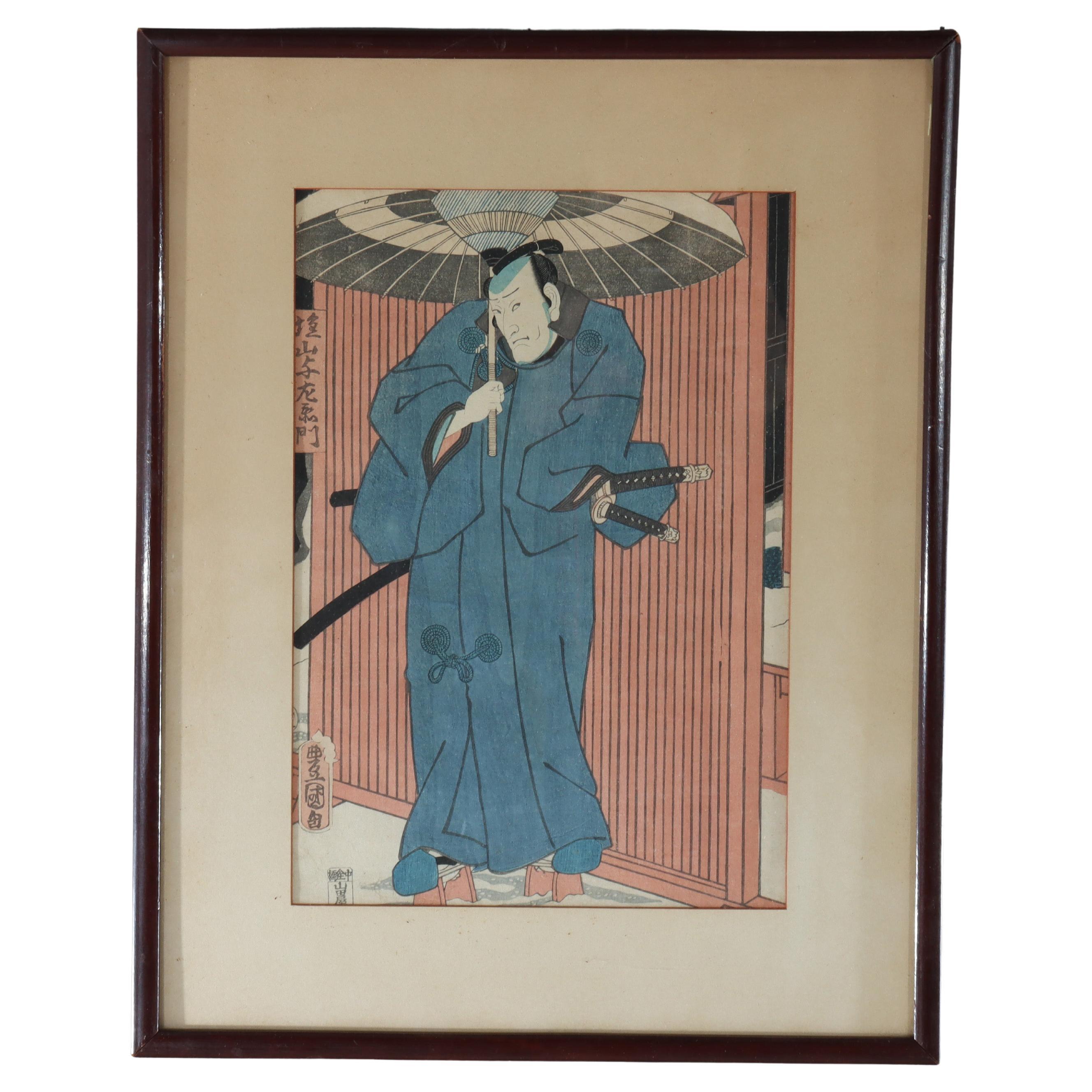 Ancienne gravure japonaise sur bois d
un acteur de Kabuki par Utagawa Kunisada 19ème siècle en vente