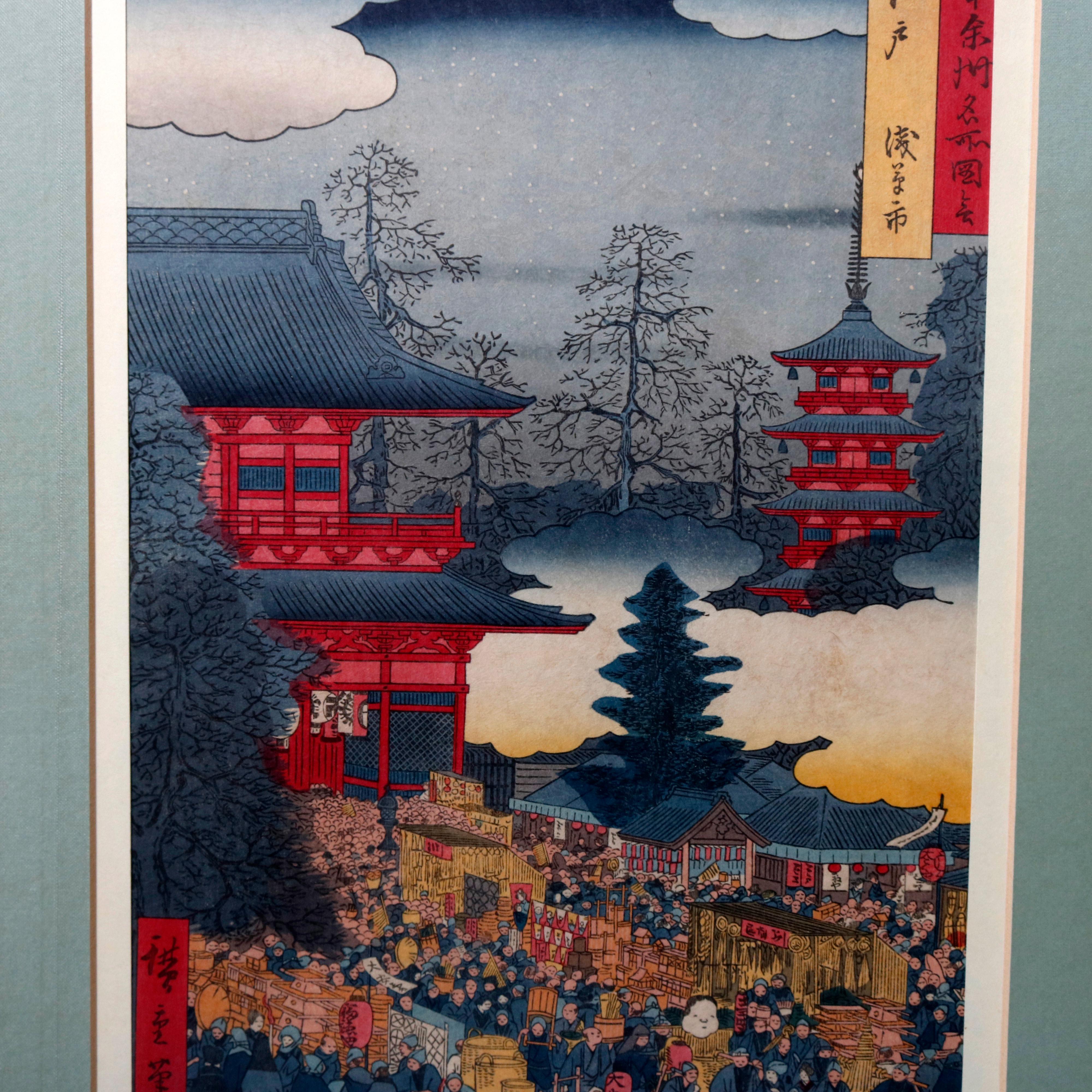 An antique Japanese Hiroshige woodblock print depicts village scene with figures, horses, structures (pagodas) and lake in the background, signed lower left, additional verbiage upper right, circa 1850

Measures: 19.75