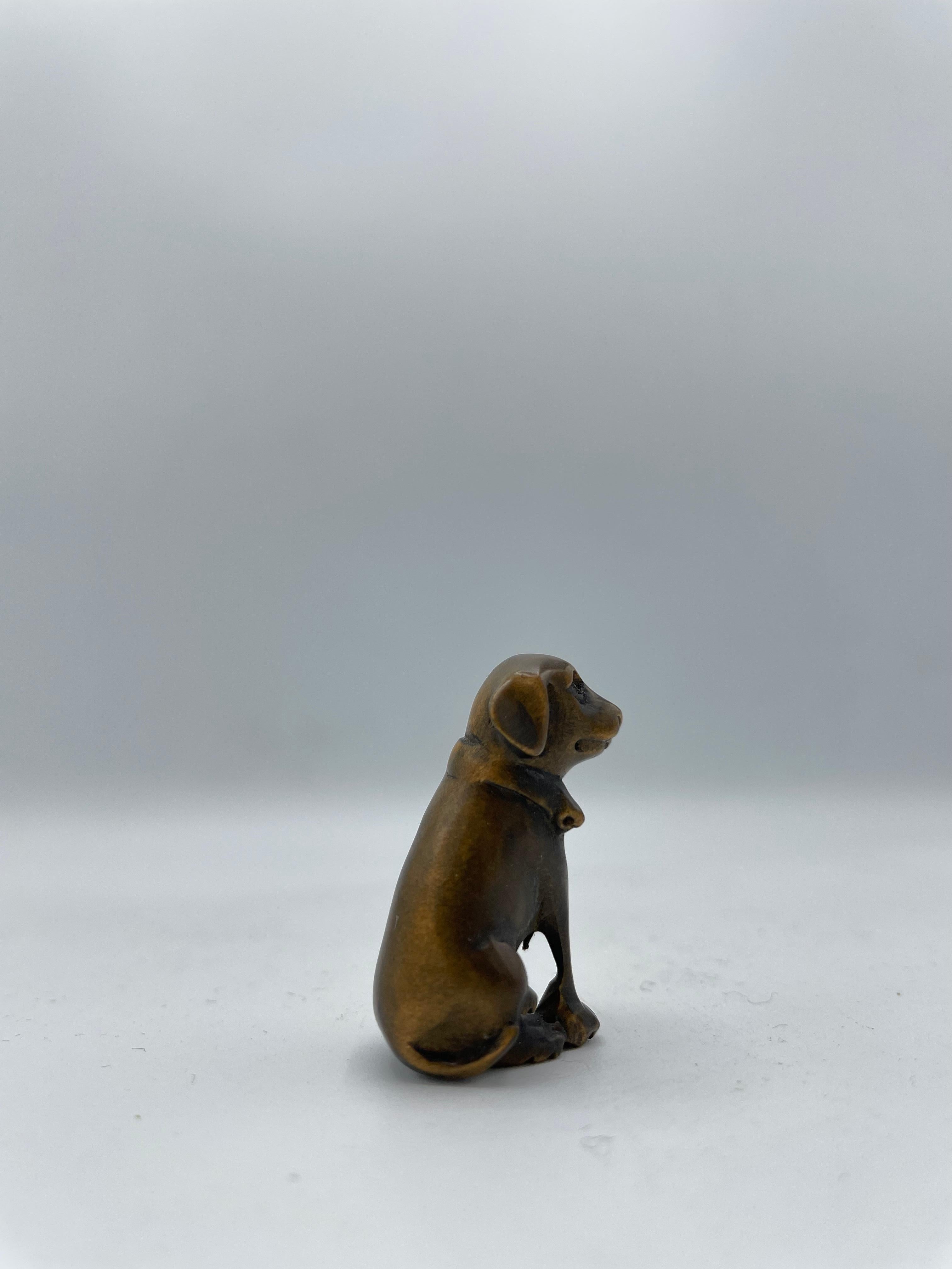 This is an antique netsuke made in Japan around Meiji period 1900s.
Netsuke is a miniature sculpture, originating in 17th century Japan.
Initially a simply-carved button fastener on the cords of an inro box, netsuke later developed into ornately