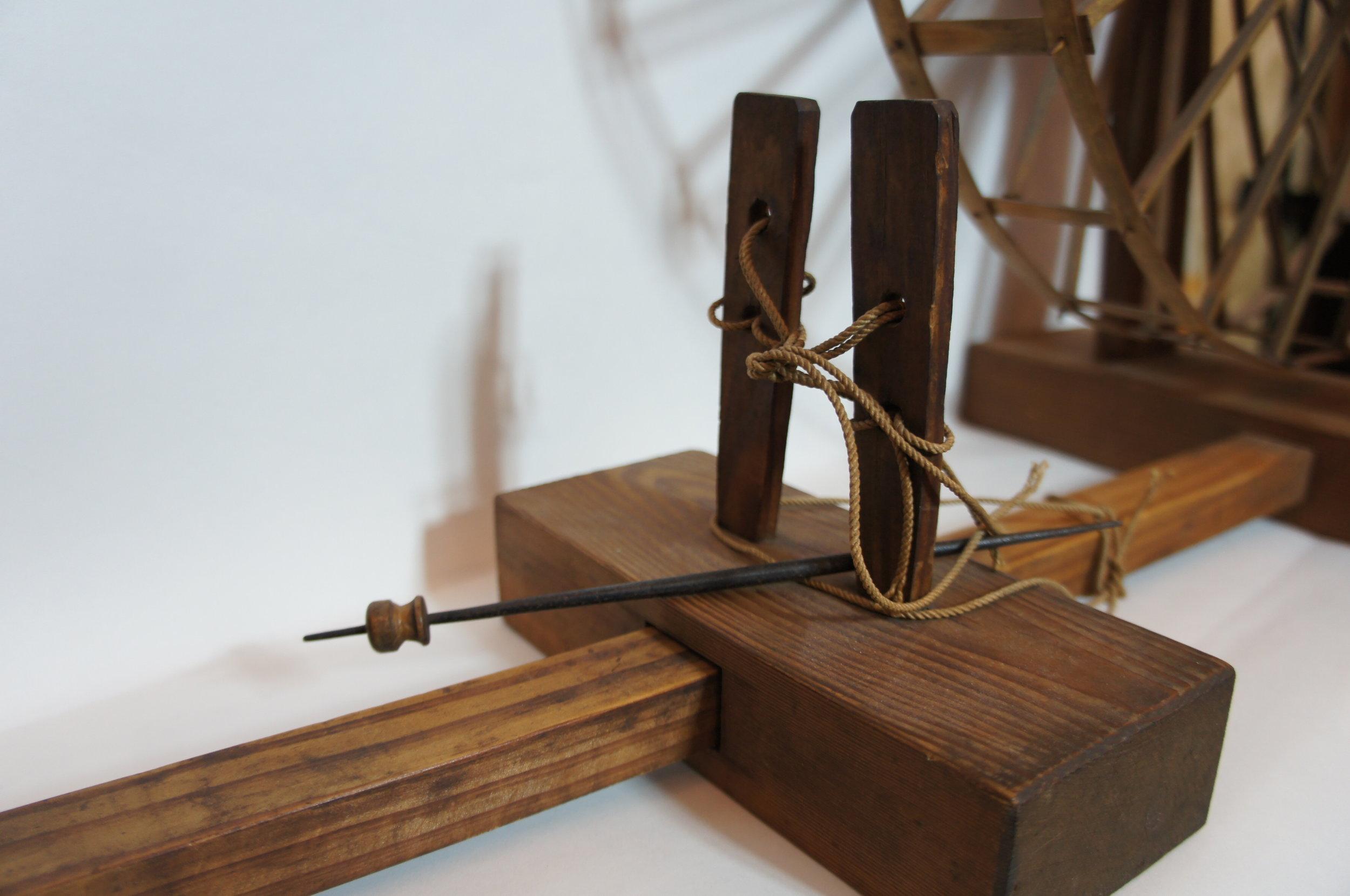 antique wooden spinning wheel