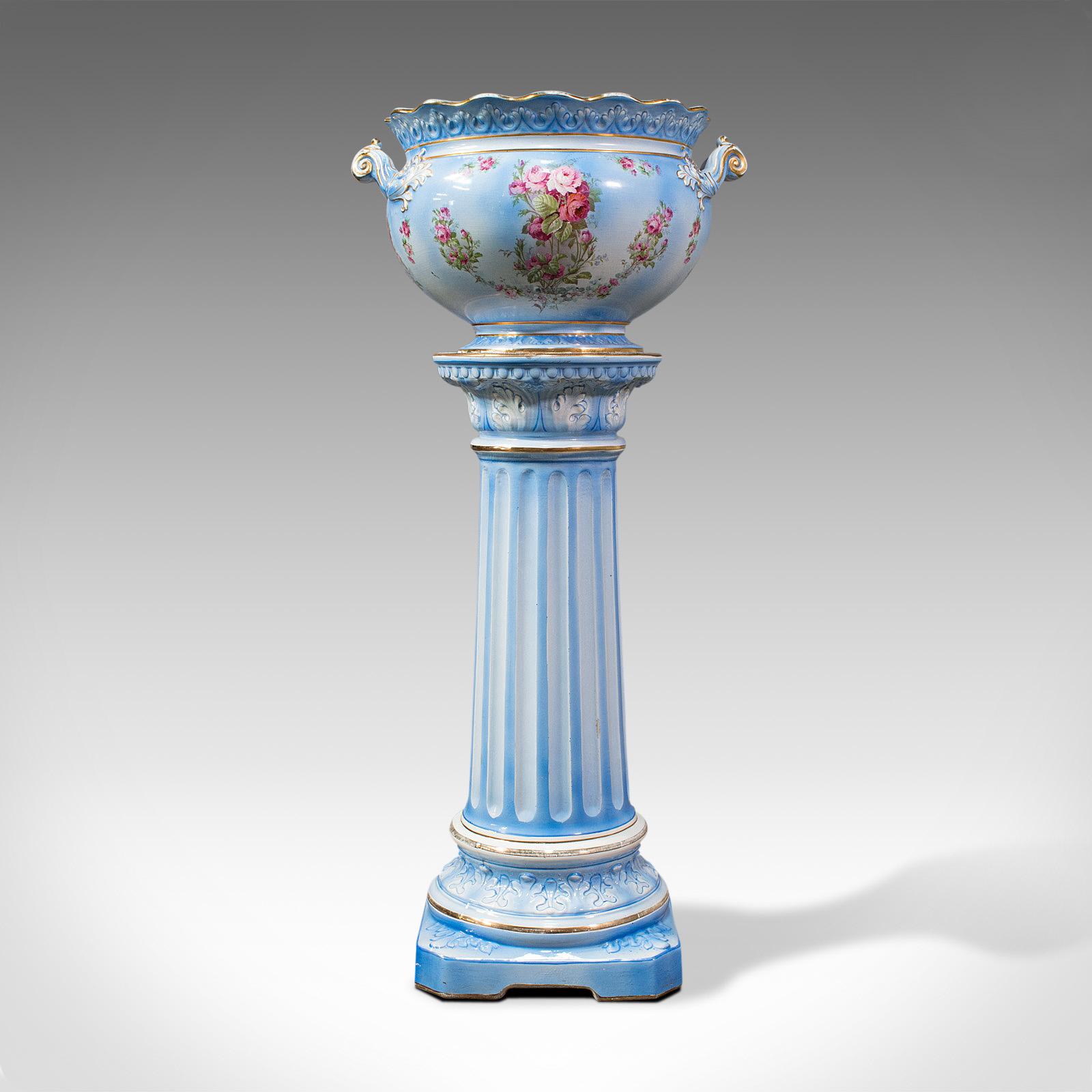 This is an antique jardinière on stand. An English, ceramic decorative planter with ornamental column, dating to the Victorian period, circa 1880.

Rich in colour and with classical and Renaissance overtones
Displaying a desirable aged patina -
