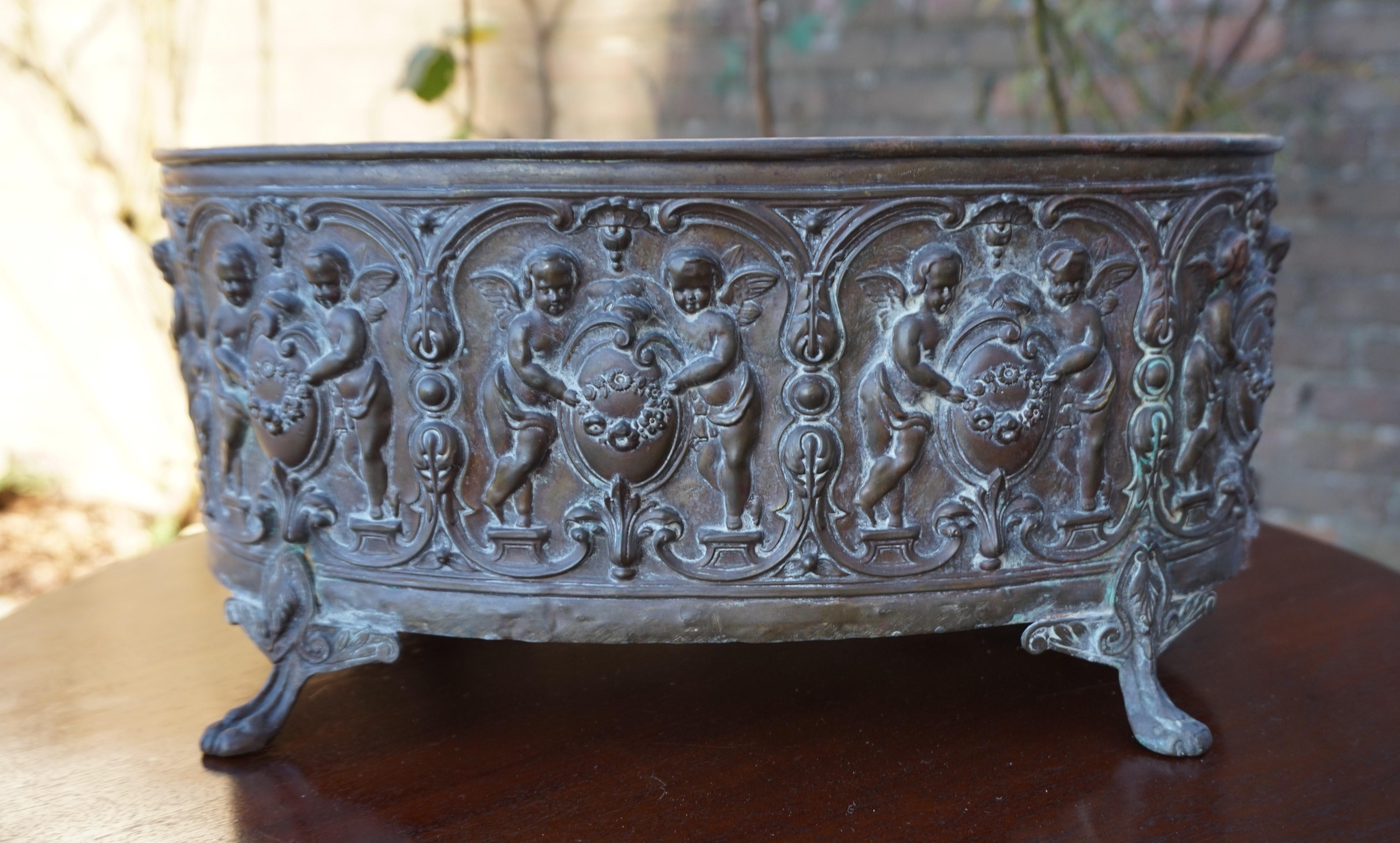 Hand-crafted and highly decorative, Renaissance Revival copper planter.

This antique jardiniere is another great example of how mid 19th century workmanship created stunning home accessories for the very well to do of that era. Mind you, the time