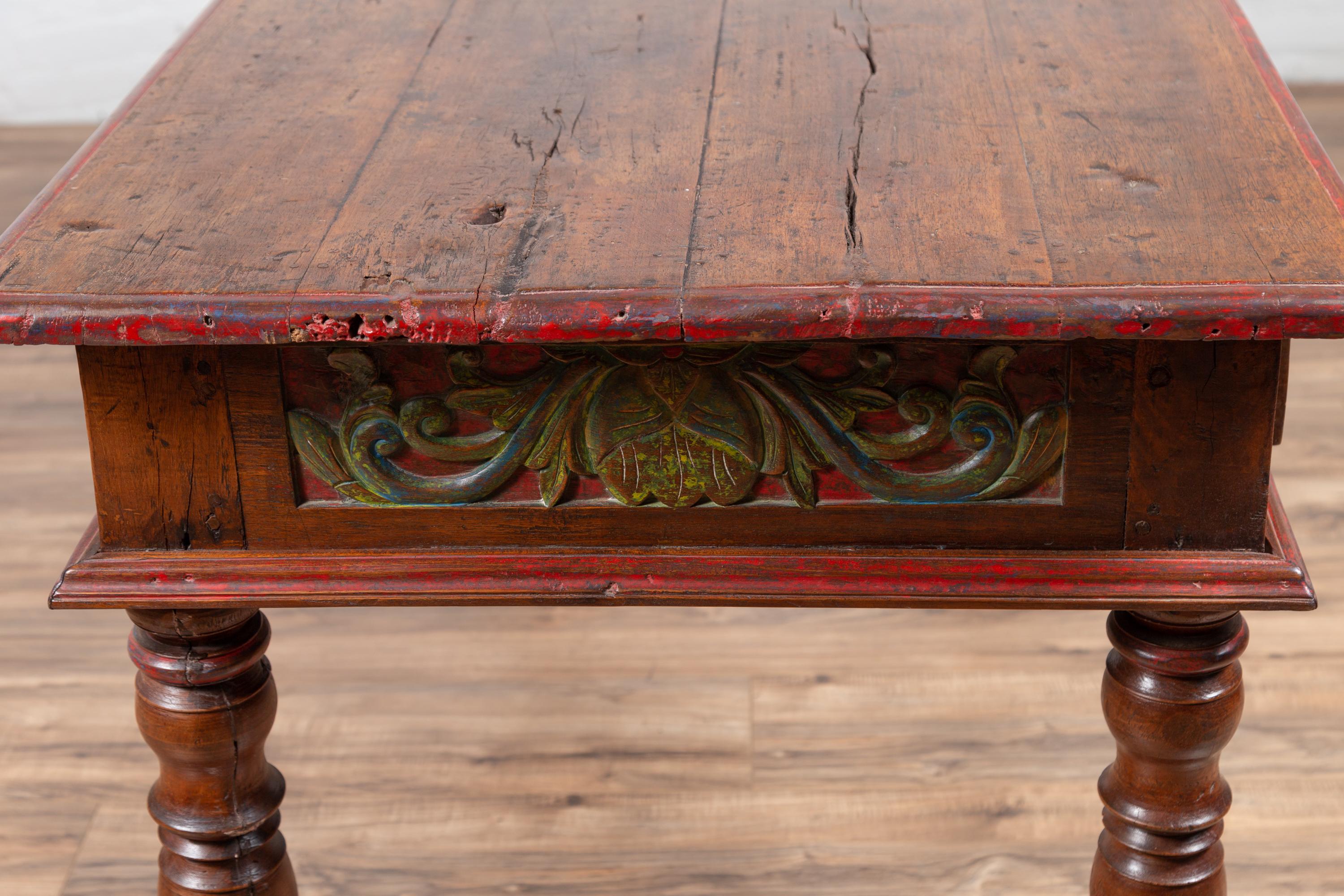 Antique Javanese Kneehole Desk with Polychrome Finish, Drawers and Carved Decor 11