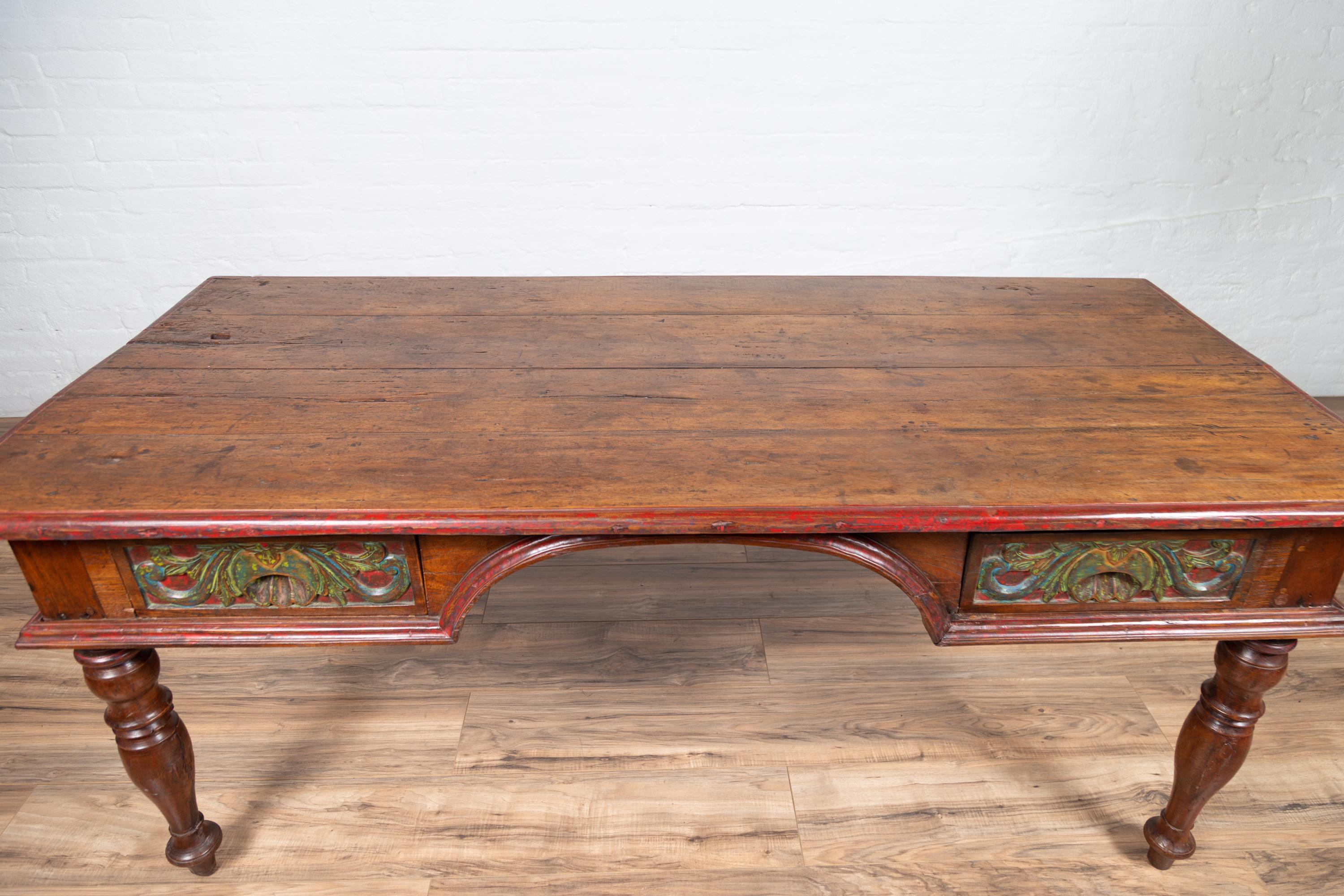 20th Century Antique Javanese Kneehole Desk with Polychrome Finish, Drawers and Carved Decor