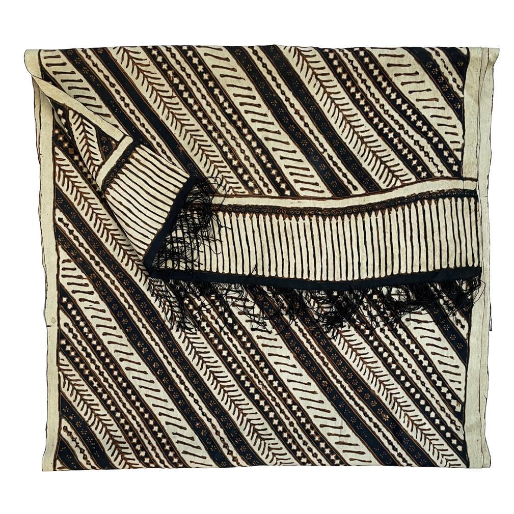 Antique Javanese Silk Batik Slendang (Selendang). A shoulder cloth length of compact hand spun silk imported from China. The diagonal patterned stripes design created by hand in wax resist in Indonesia with vertical stripe band on either end
