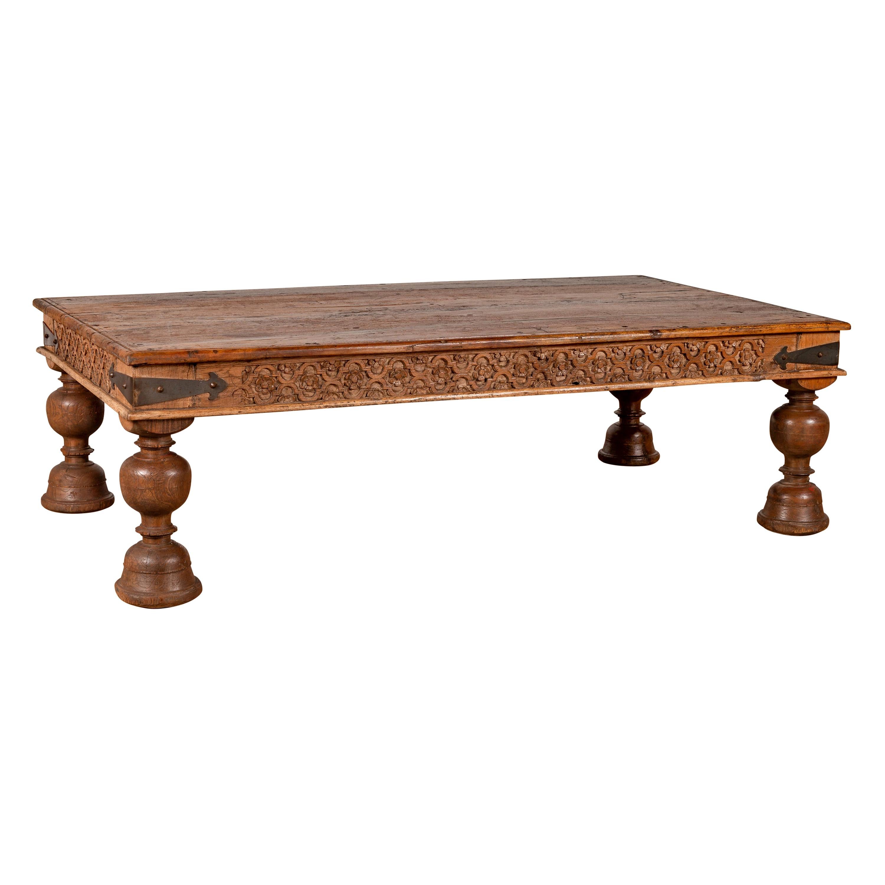 Antique Javanese Teak Wood Coffee Table with Hand Carved Floral Themed Apron
