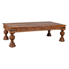Antique Javanese Teak Wood Coffee Table with Hand Carved Floral Themed Apron