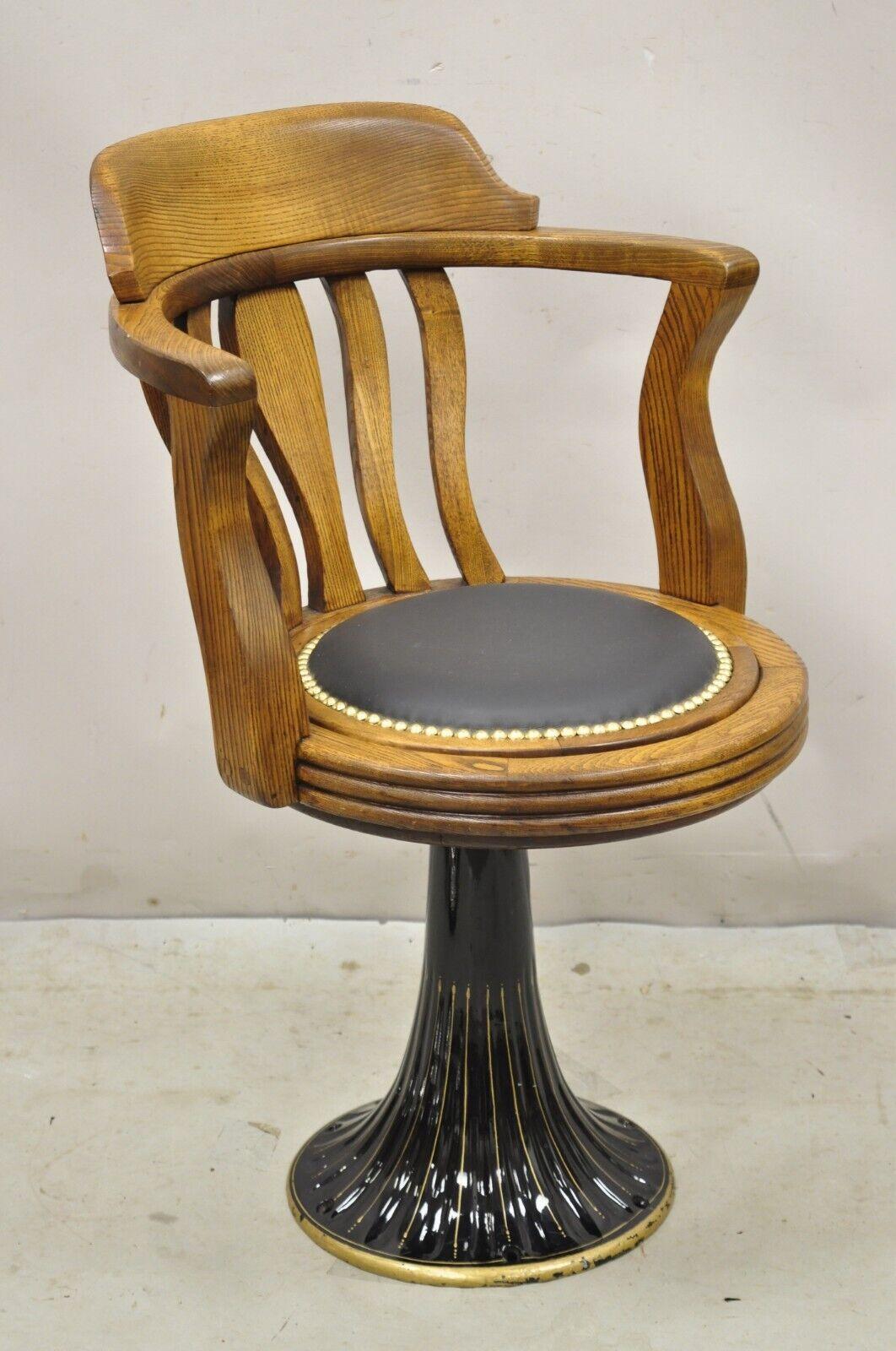 Antique JB Van Sciver Oak Wood Swivel Ship Captains Courthouse Chair. Item features a floor mount, porcelain enamel cast iron pedestal base, reversible seat with cane and Naugahyde, original label, very nice antique item, quality American
