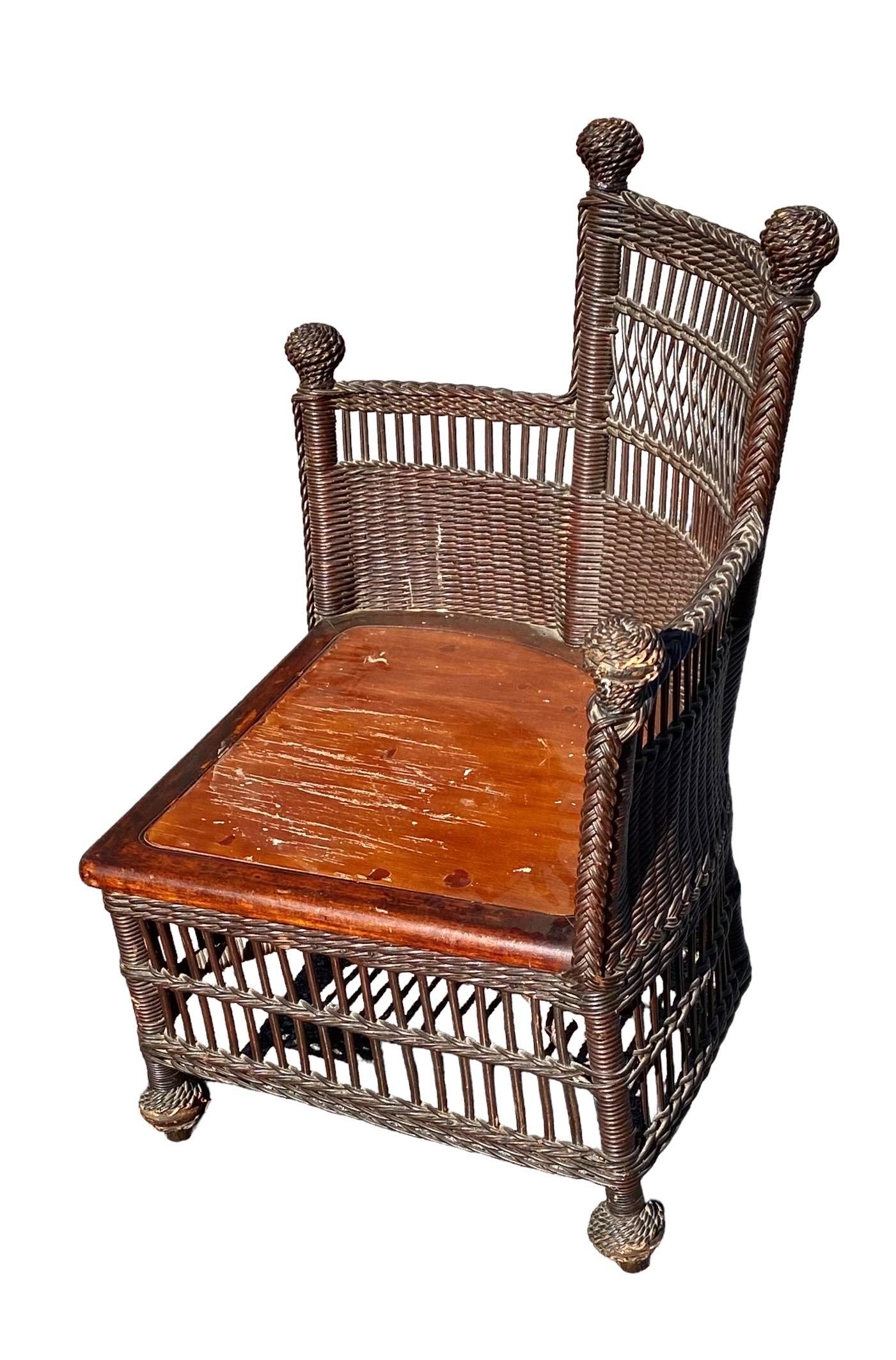Hand-Woven Antique Jenkins and Phipps Wicker Corner Chair For Sale