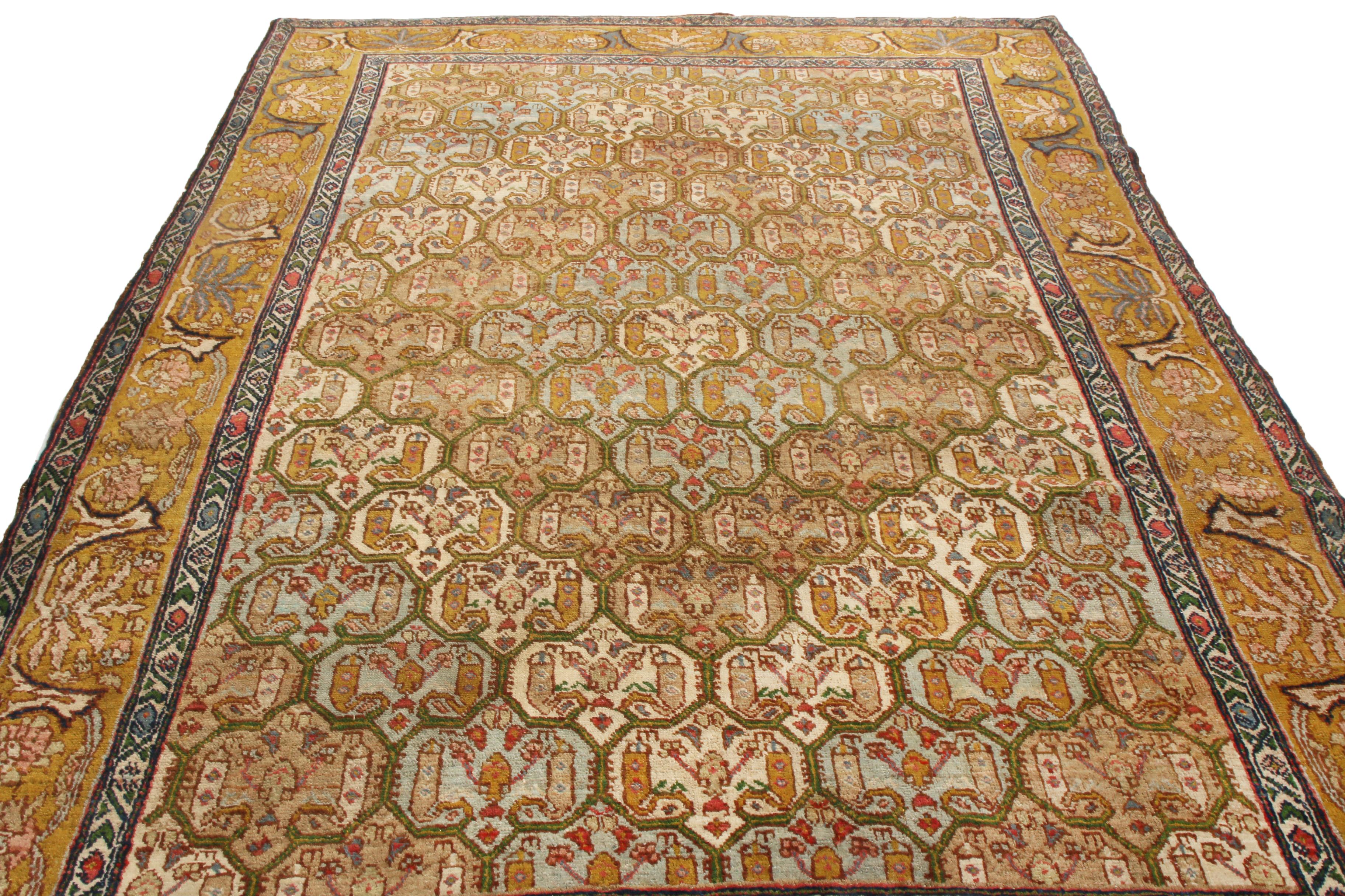 Hailing from 1890 with possible origins in Israel and Syria, this antique Jerusalem wool rug depicts a fine series of uncommon Boteh design patterns in unique, complementary colorways. Hand knotted in high quality wool, the rippling field design
