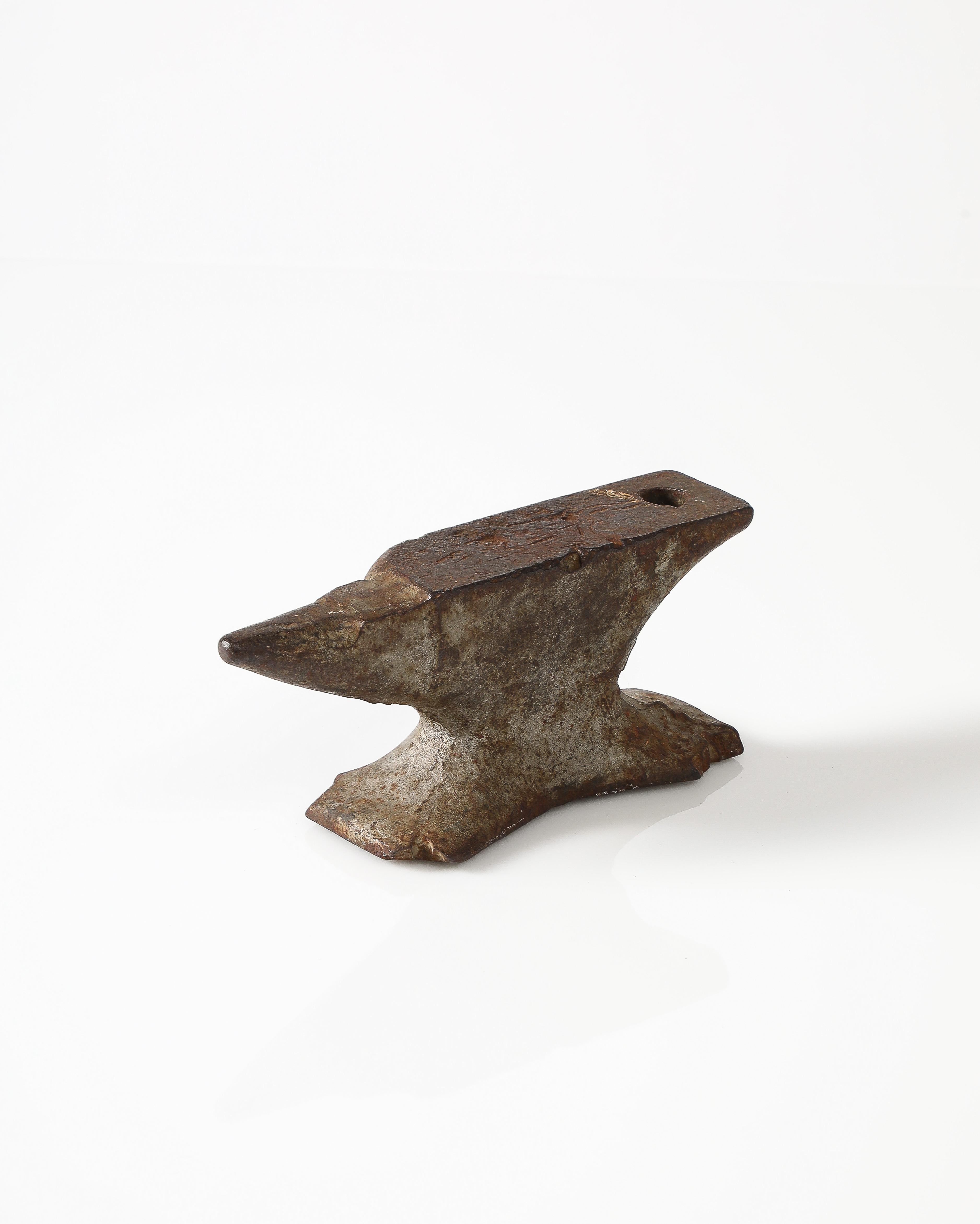 Vintage jeweler's anvil, minor wear consistent with age and use.