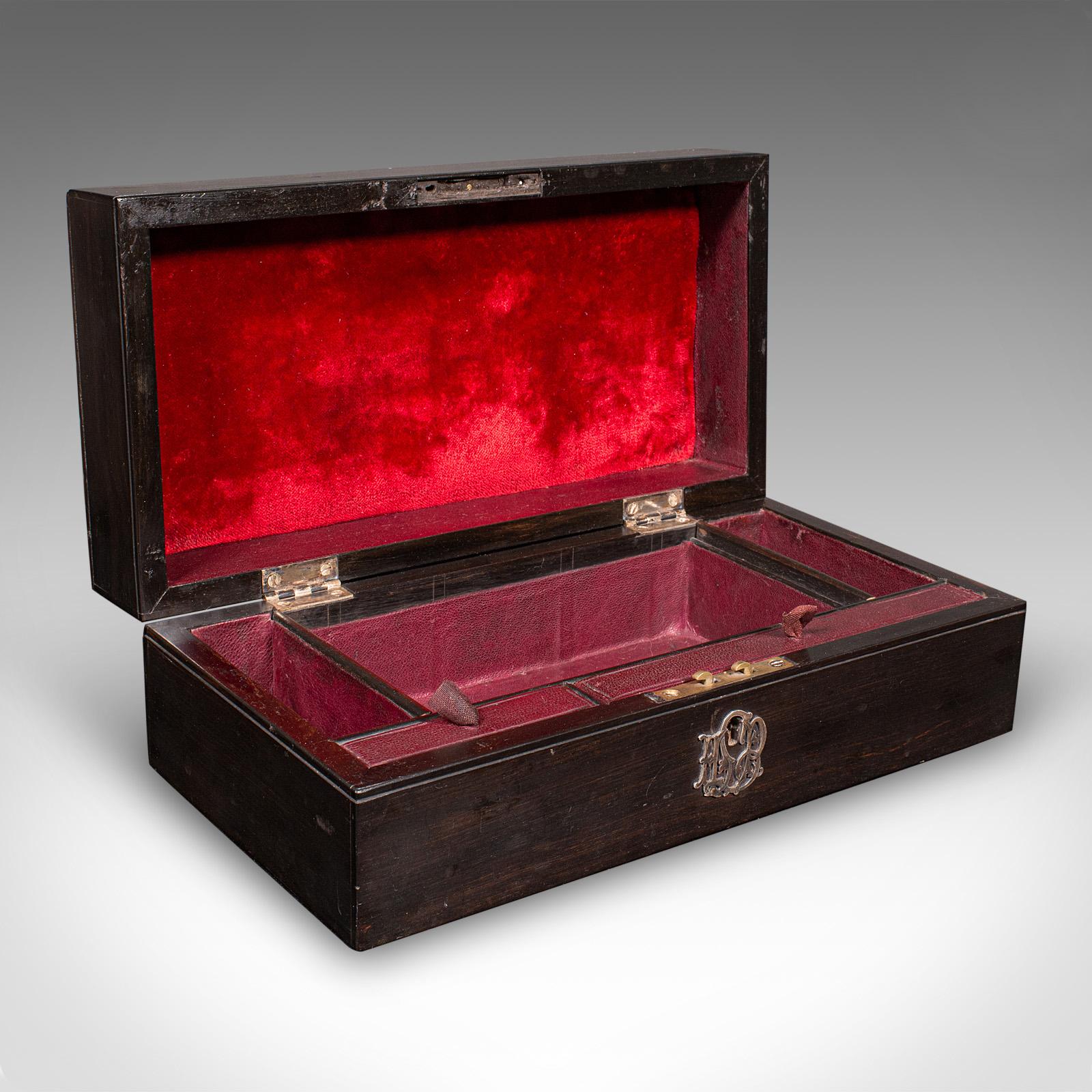 This is an antique gentleman’s jewellery box. An English, coromandel keepsake casket in Aesthetic movement taste, dating to the late Victorian period, circa 1900. Distinguished by its unusual pyramid lid detail, this exquisite piece offers a rare