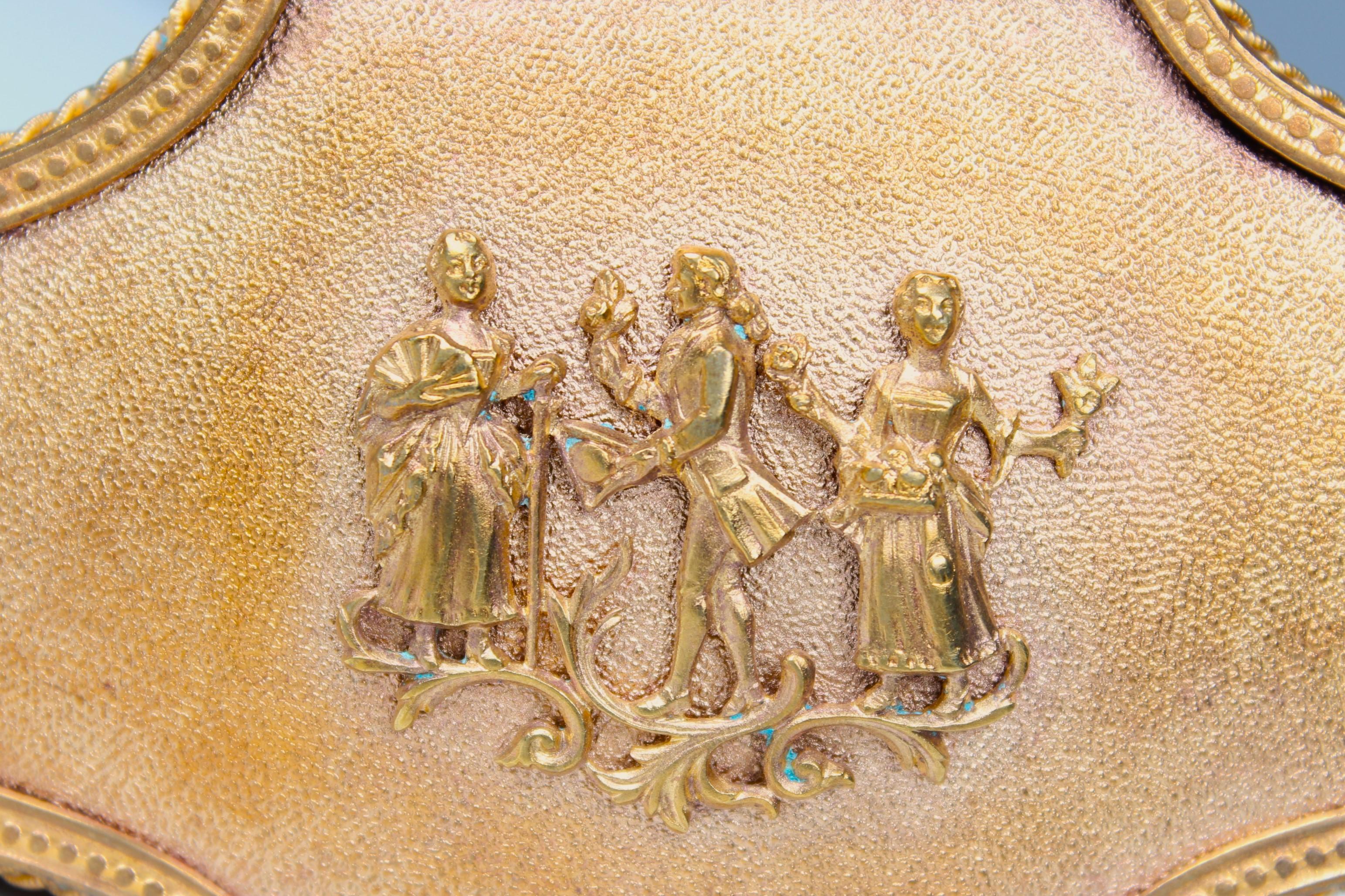 Beautiful antique jewelry box with fine application on the lid of three Parisian dancing.
Padded with burgundy velvet.
Gilded brass, France, Circa 1880.



