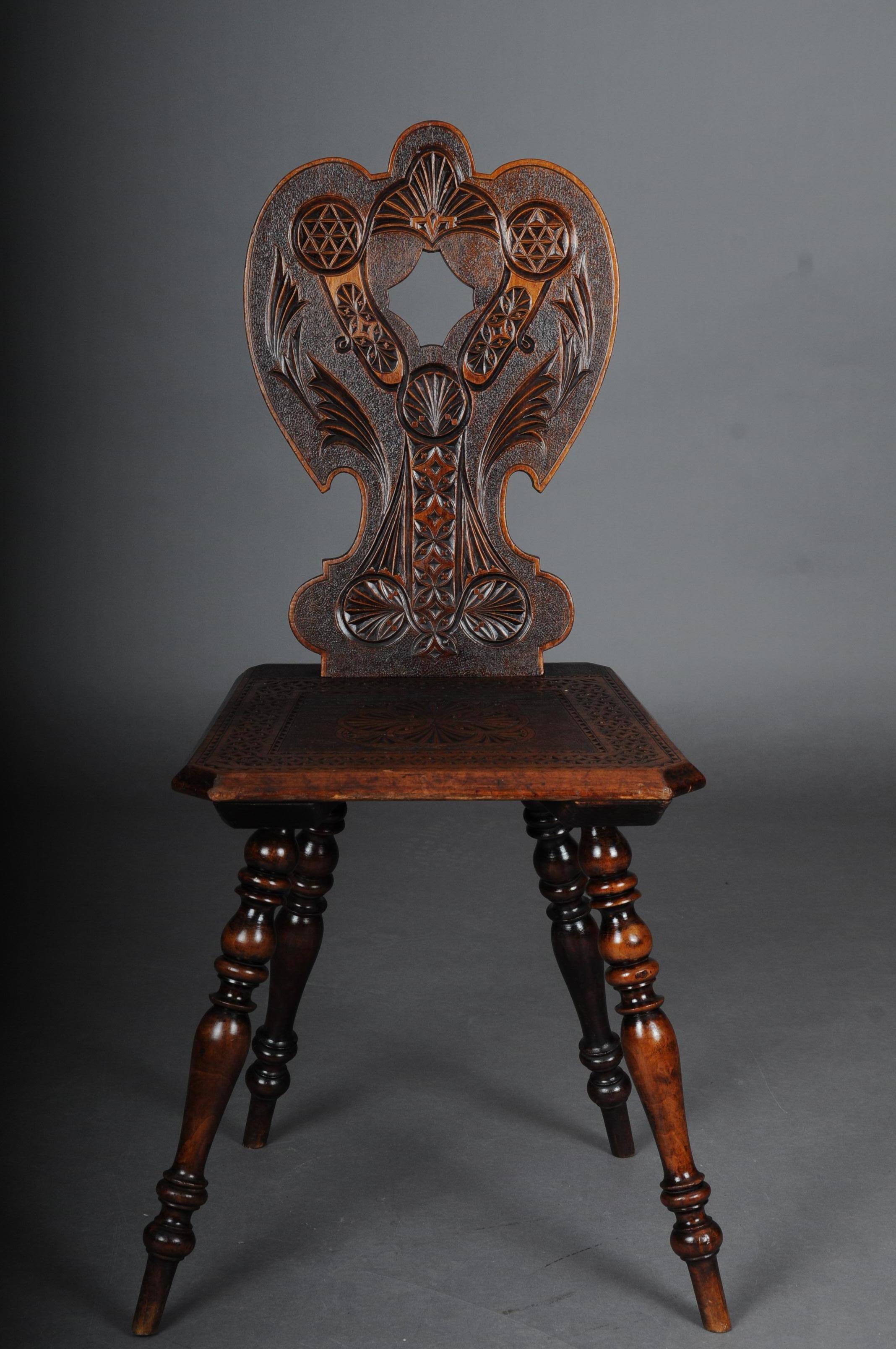 Antique Neo Renaissance board chair historicism circa 1870, oak D

Solid dark oak. Straight seat on turned and tapered legs. Jewish.
Backrest with Davidstern notched carvings. Extremely decorative and rare historicism chairs with rich