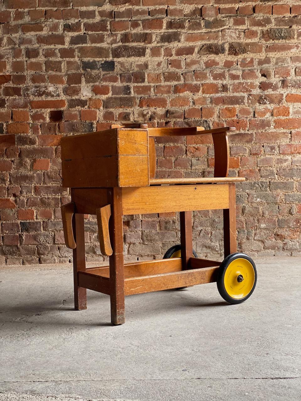 Antique jockey weighing chair scales, English horse racing, circa 1930

Fabulous piece of English antique horse racing history, a fully functioning set of golden oak weighing scales for jockeys, has a seat that acts as a large scale that precisely