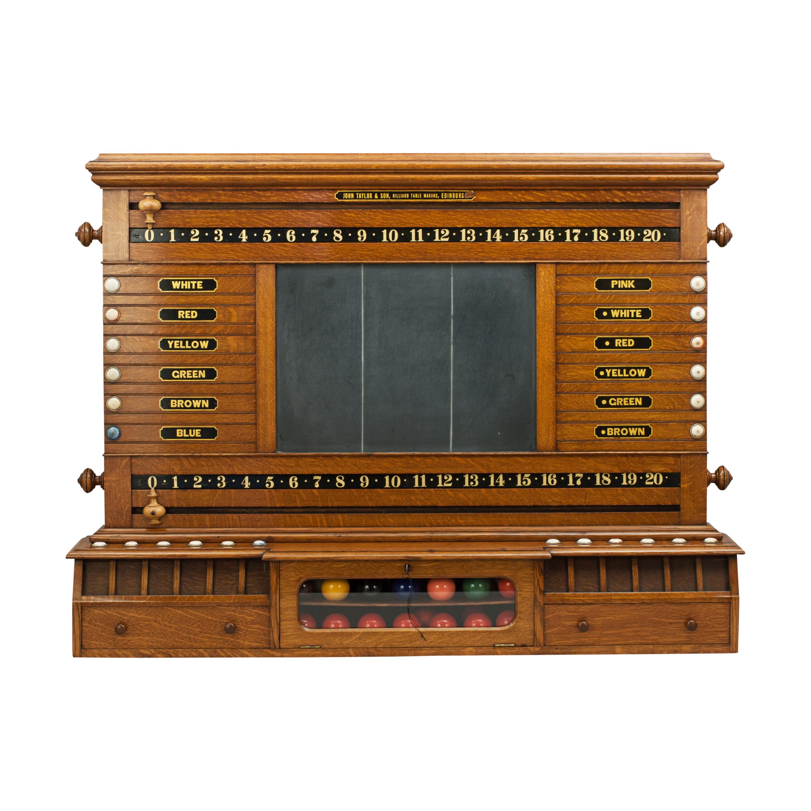 John Taylor & Son snooker score board, life pool, ball cabinet.
A nice combined billiards and life pool scoreboard made of oak by John Taylor & Son, Edinburgh. The billiard scorer sits upon a lockable ball cabinet that can house 28 balls. The