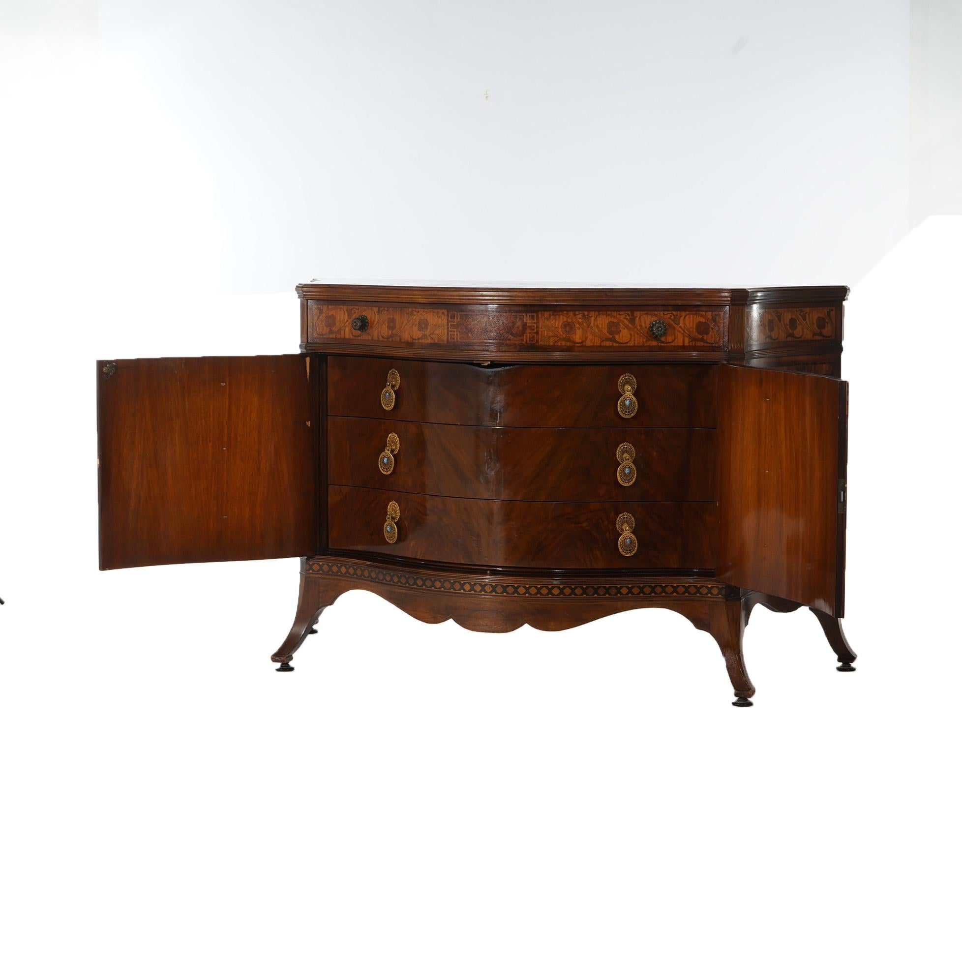***Ask About Reduced In-House Shipping Rates - Reliable Service & Fully Insured***
An antique French style sideboard by Johnson Furniture Co. offers rosewood and satinwood construction with floral and scroll marquetry inlay throughout and in swell