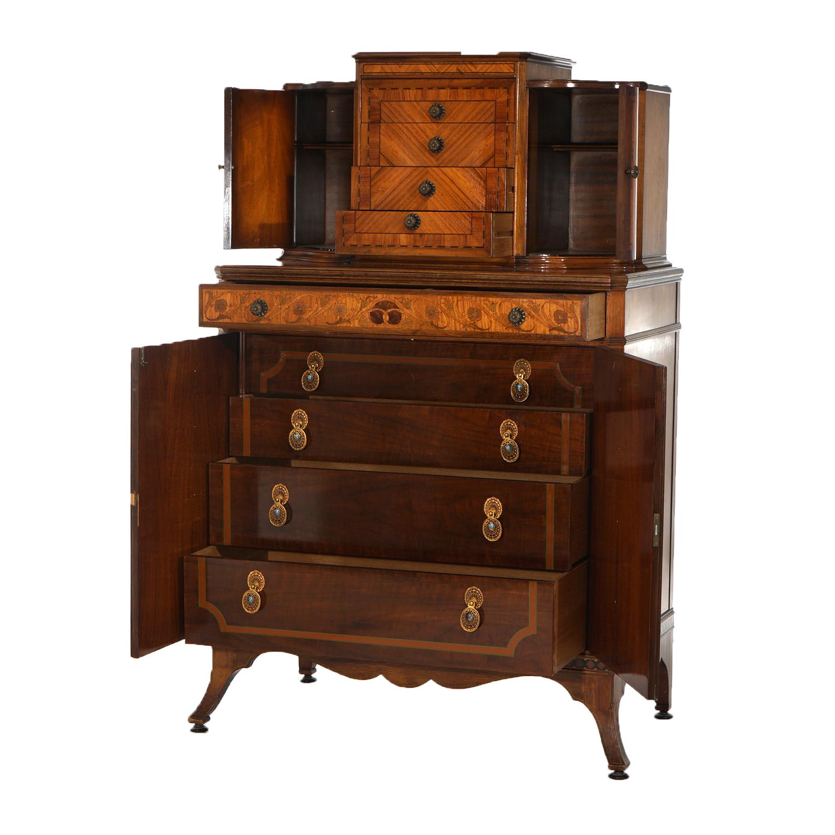 ***Ask About Reduced In-House Shipping Rates - Reliable Service & Fully Insured***
An antique chifferobe dresser by Johnson Furniture Co. offers satinwood and mahogany construction with floral marquetry and upper drawer tower having flanking blind