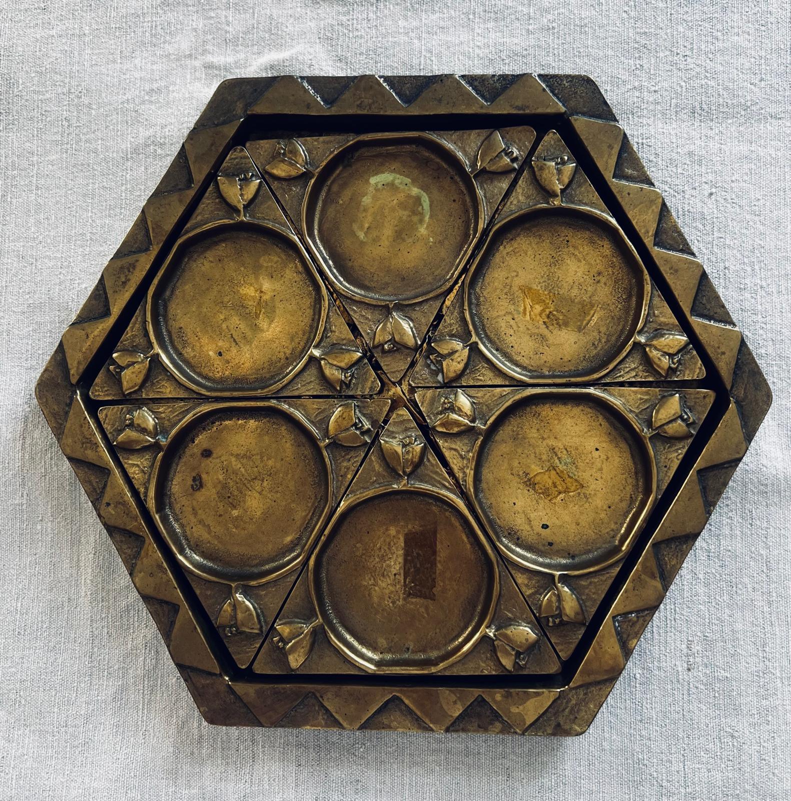 It is an absolutely outstanding with very rare and original design Seder Plate, hand-crafted out of Bronze by famous art deco maker Koloman (Kolo) Moser who was one of the founders of Vienna Workshop (Wiener Werkstätte), Vienna, Austria. 
The