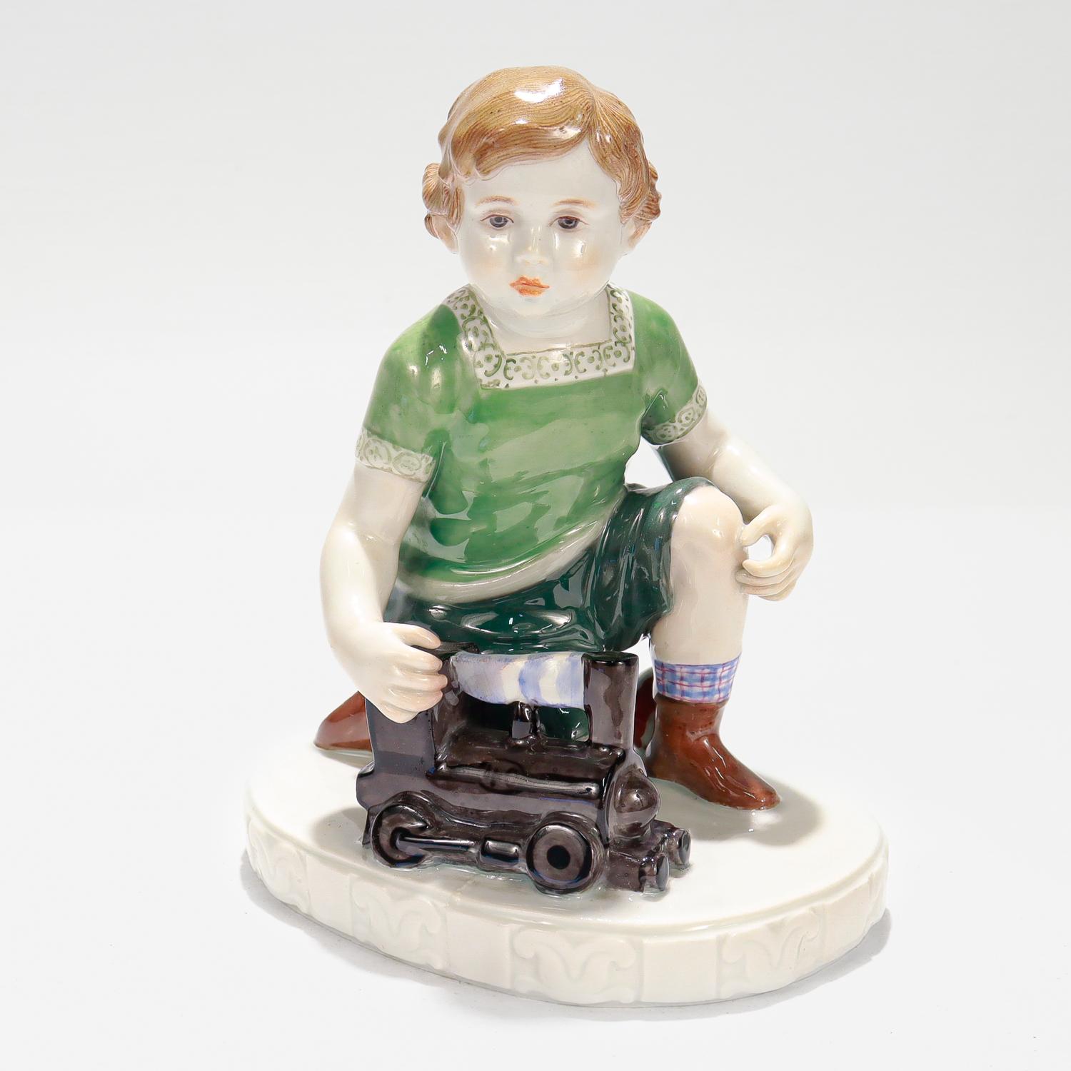 Jugendstil Antique Jugenstil Meissen Porcelain Boy & Toy Train Figurine by Eric Oehme A232