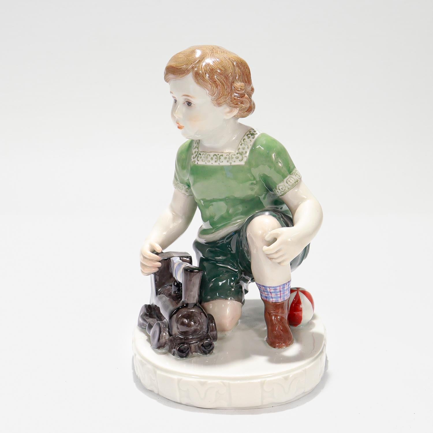 German Antique Jugenstil Meissen Porcelain Boy & Toy Train Figurine by Eric Oehme A232