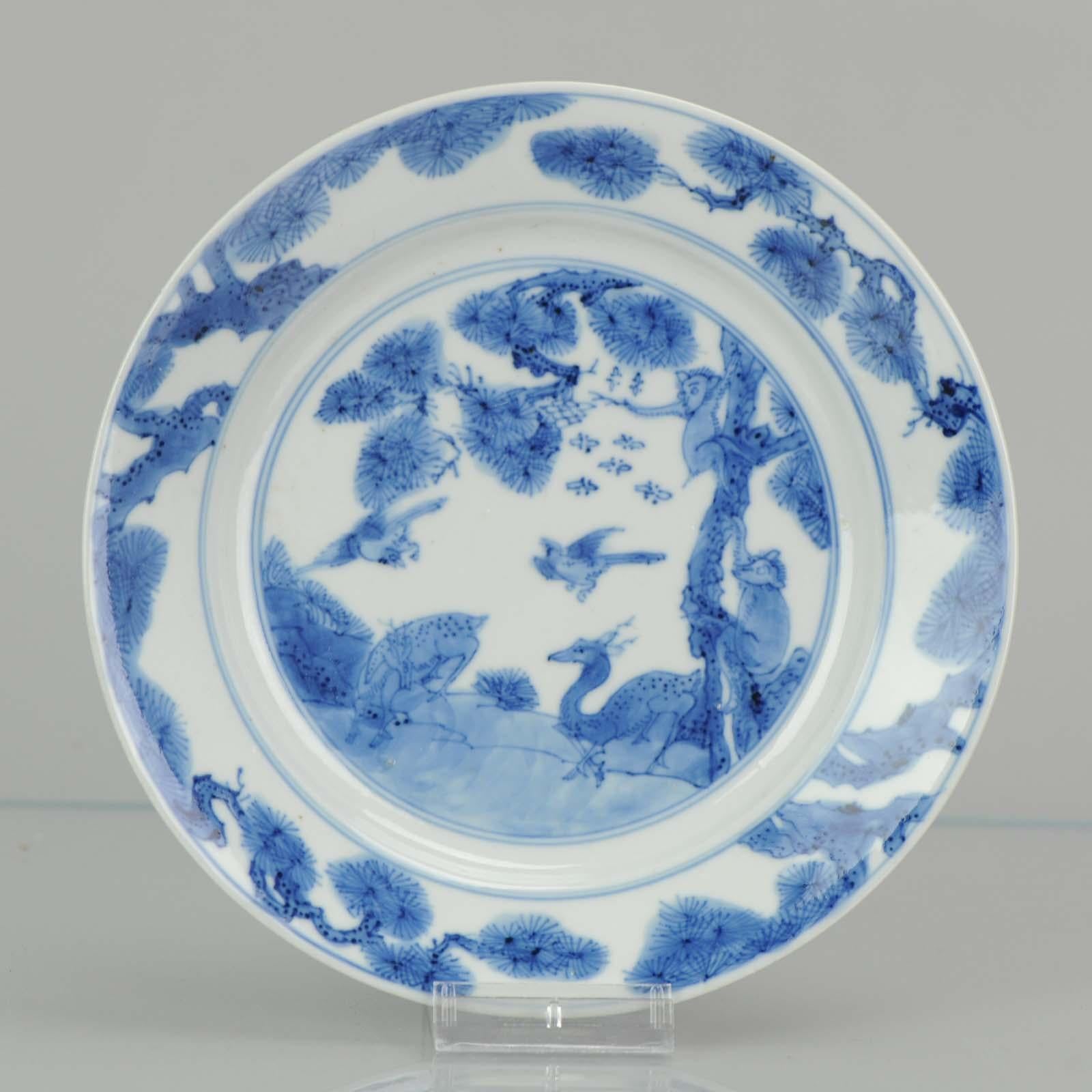A very nicely plate with a rare scene of monkey, bees, magpie, and dee. Unusual Xuande mark at the base.

Visual puns, often made by using homophones, are a popular design language in Chinese art. In addition to being a zodiac animal, the monkey