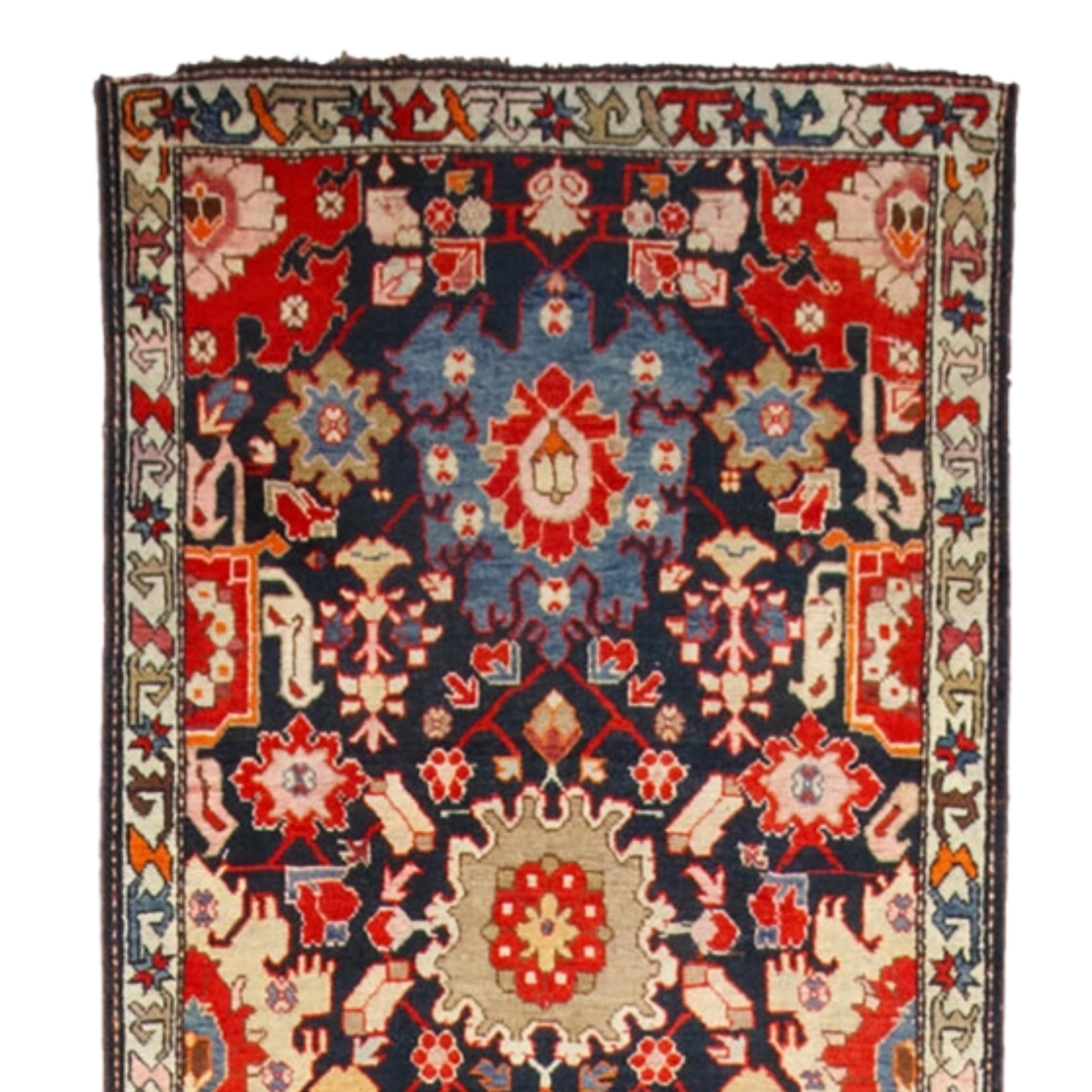 19th Century Karabag Runner
Size: 105x577 cm

This impressive 19th-century Karabakh Rug is a masterpiece reflecting the elegant and sophisticated craftsmanship of a historical period.

Rich Patterns: The runner is decorated with intricate floral