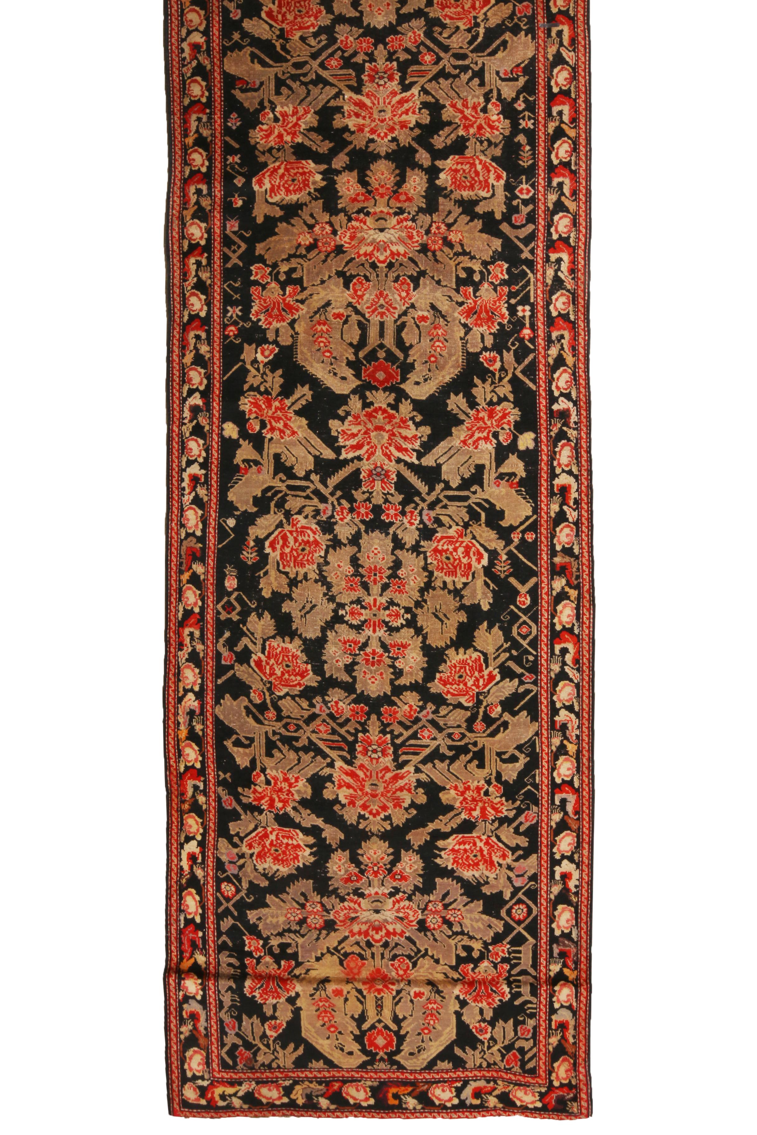 Originating from Russia in 1900, this hand knotted antique Karabagh Persian runner features high quality wool and a unique colorway. Though the finely woven guard, central, and innermost borders wrap the runner with un-betrayed repetition, the