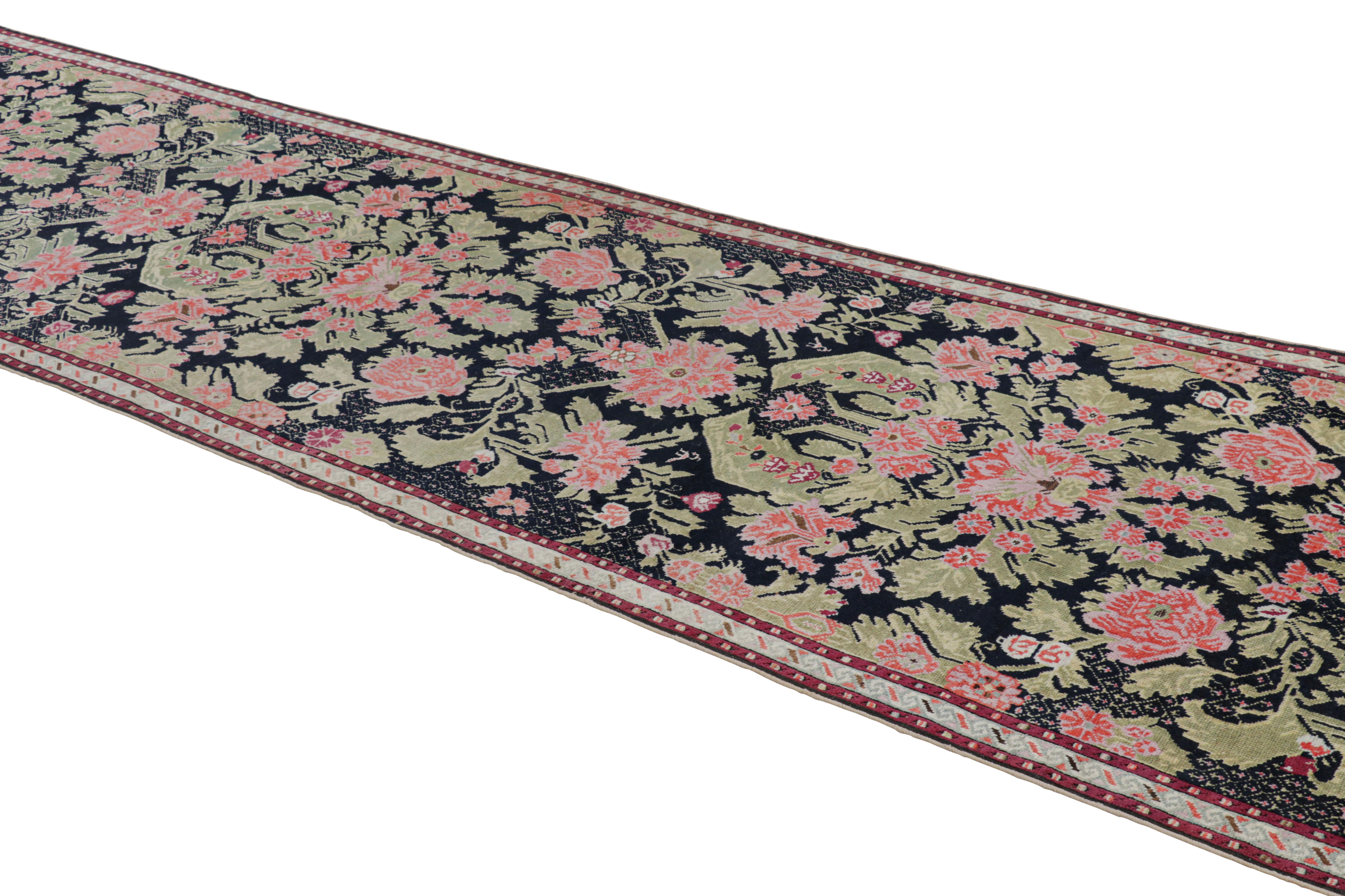 Made with hand-knotted wool circa 1880, this 4x16 Antique Karabagh runner rug from Russia is a particularly special piece, featuring a light and refreshing mid-century classical floral design—an exciting new curation from Rug & Kilim’s rare
