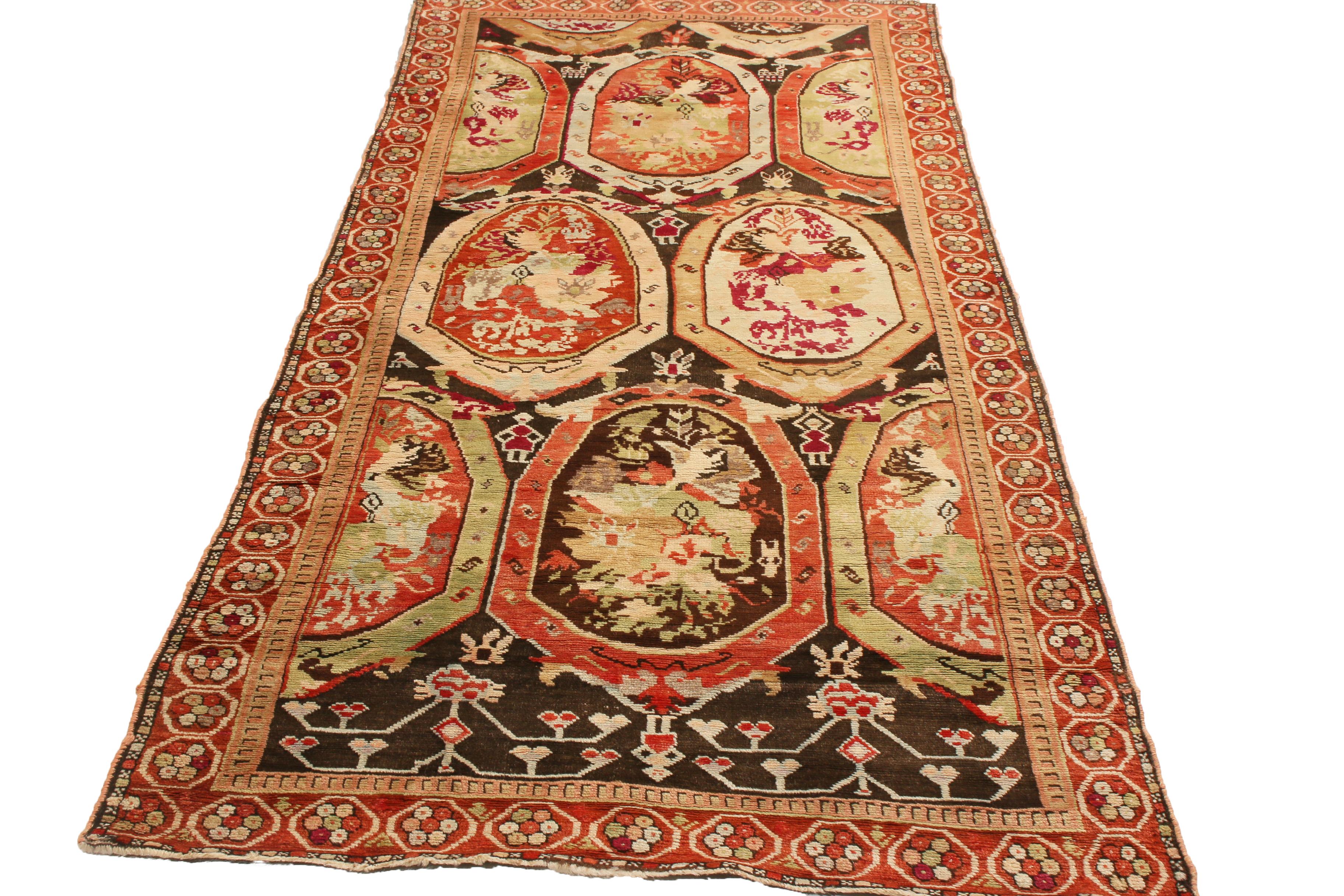 Originating from Russia between 1880-1900, this vintage Karabagh runner enjoys both tribal geometric and European floral influences in this all over field design. Hand knotted in high quality wool, the combination of oak brown, beige, and pink