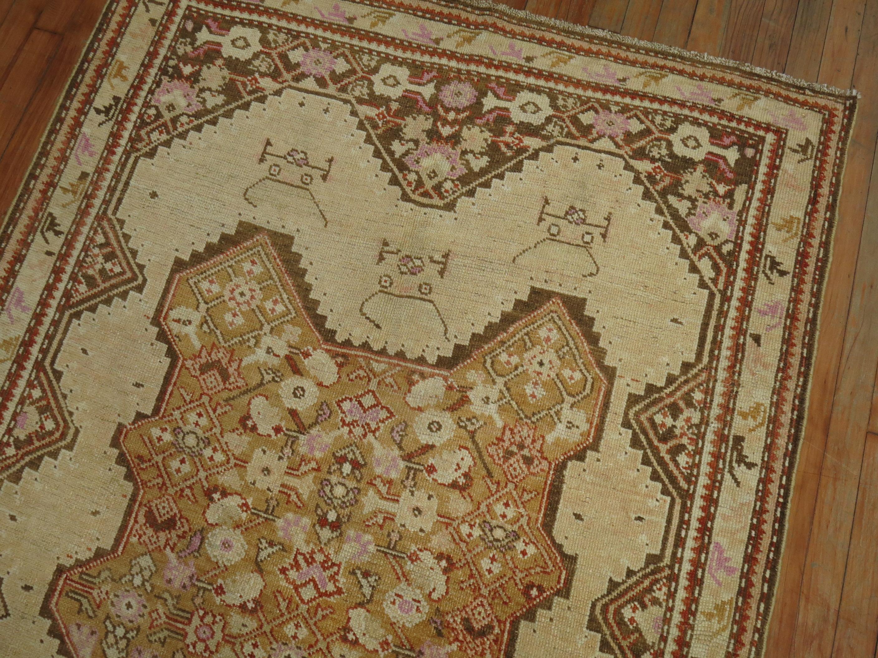 An early 20th Century Russian Karabagh rug w

Measures: 4'3'' x 6'7''.