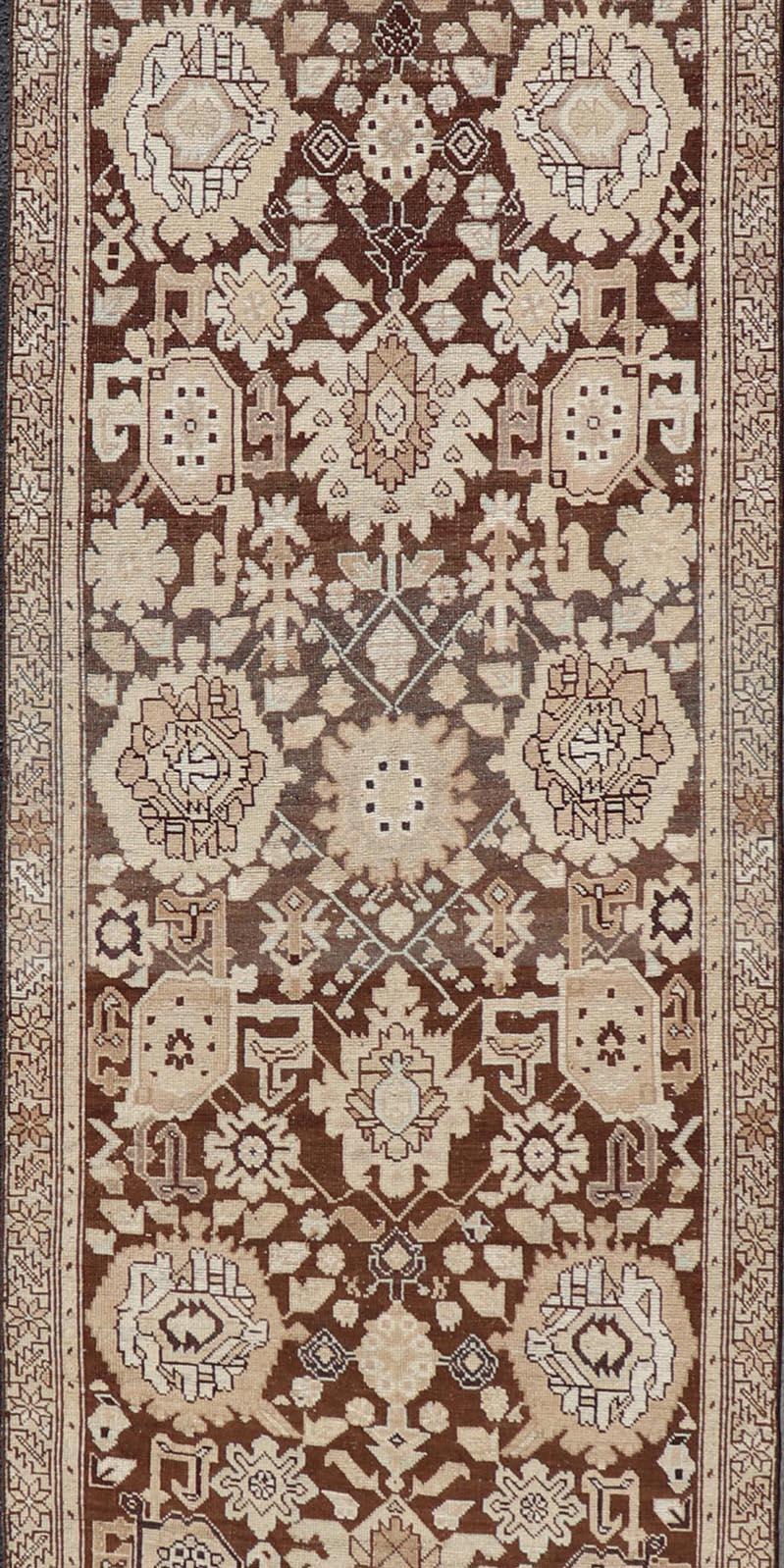 Antique Karabagh in brown and tan colored antique Karabagh runner with floral design, Keivan Woven Arts / rug EMB-9619-P13569, country of origin / type: / Karabagh, circa 1900.

Measures: 3'4 x 15'7.