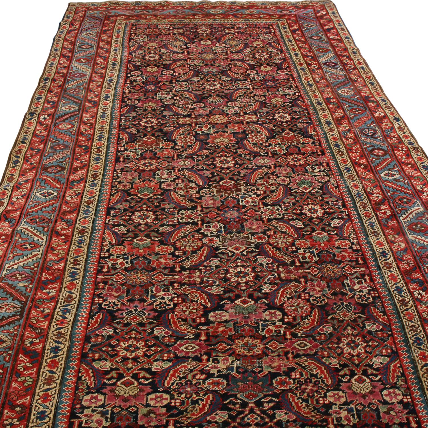 Originating from Russia between 1880-1890, this antique Karabagh rug enjoys a special variation of the Herati field design, sometimes known as the “fish” pattern for the resemblance of its finely stylized leaves in surrounding elegant rose patterns.