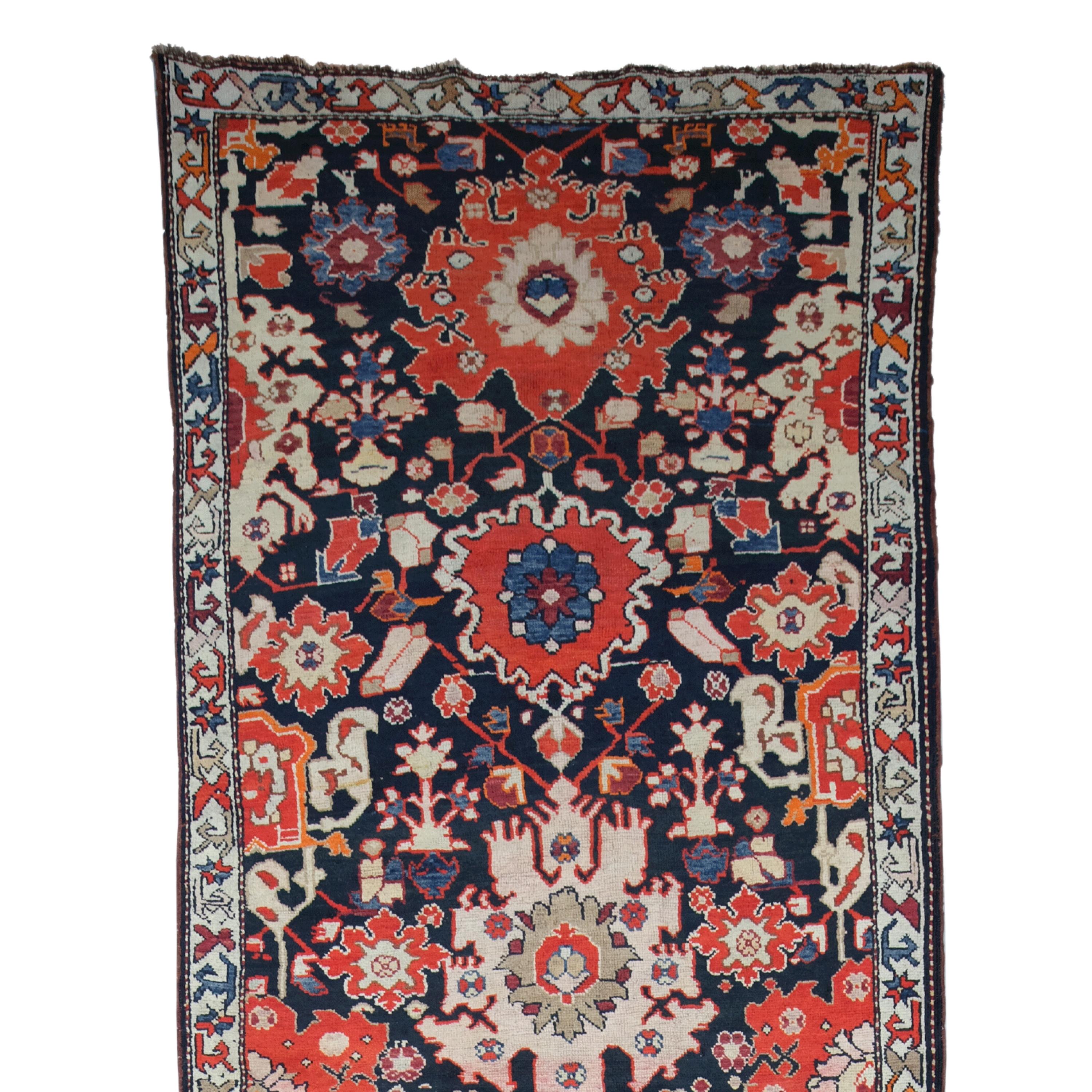 We offer a magnificent 19th century antique Karabakh runner that weaves history, art and culture into every fiber. With its intricate patterns and vibrant colors, this piece is not just a carpet, but a narrative of the rich Karabakh
