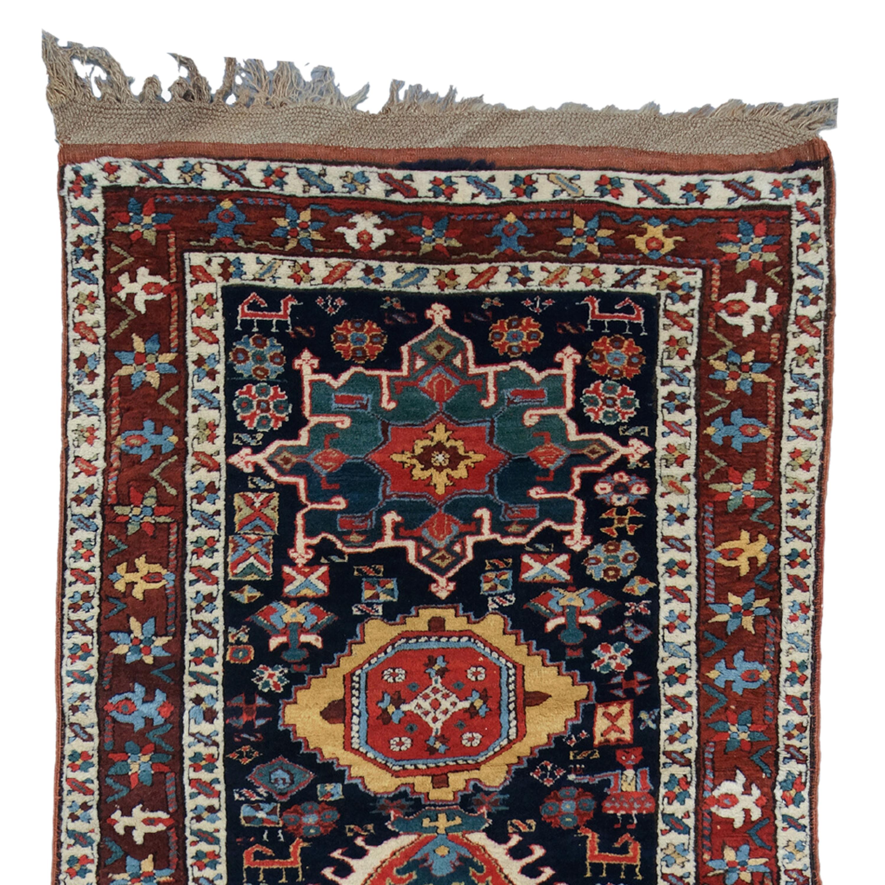 A Historical Artifact: 19th Century Caucasian Karabakh Road

If you want to add a historical and cultural artifact to your home, this antique runner is for you. This runner is a Caucasian-Karabakh runner from the 19th century. Karabakh is one of the
