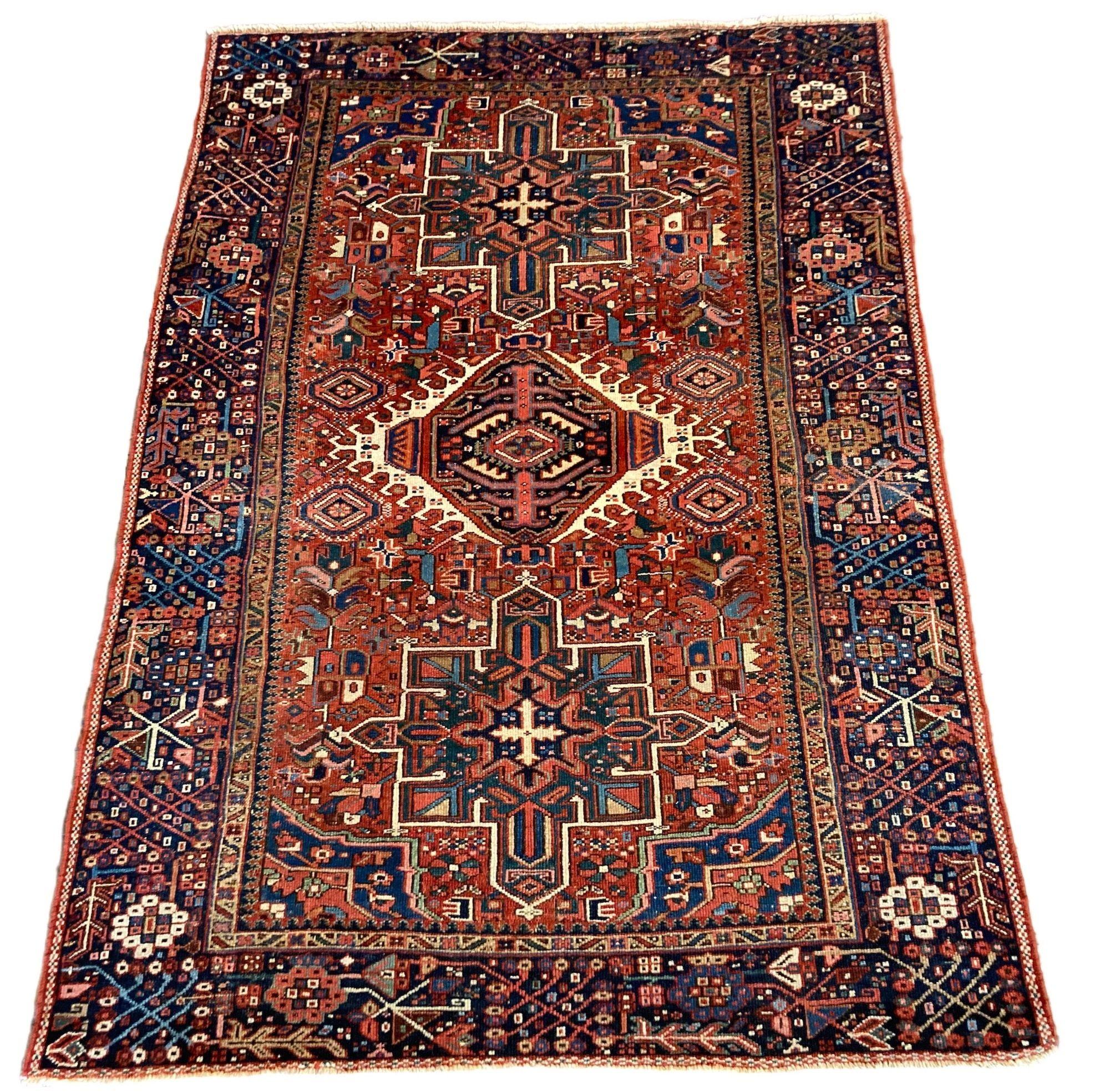 A beautiful antique Karadja rug, handwoven circa 1910 with a geometrical 3 medallion design on a terracotta field and deep indigo border. Fabulous secondary colours, especially the deep green in the medallions and highly decorative.
Size: 1.97m x
