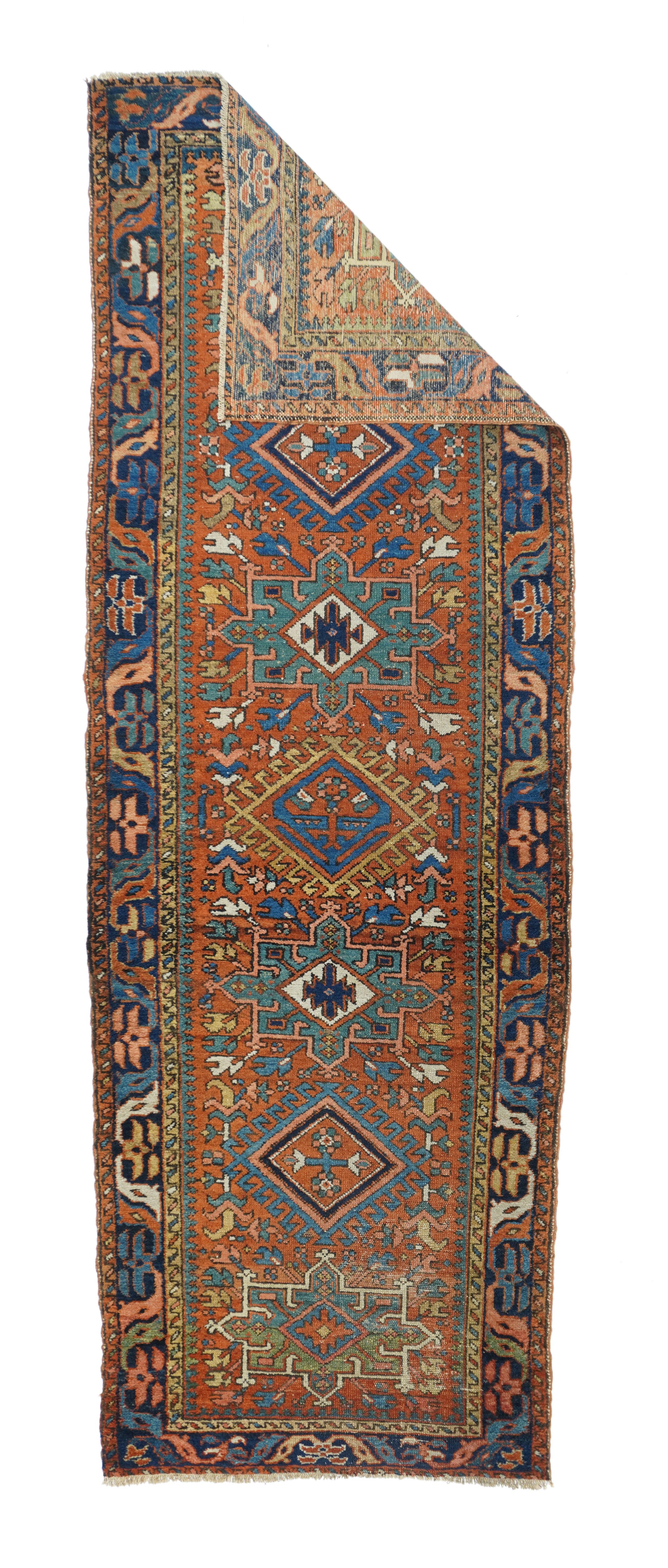Antique Karajeh rug measures 3'1'' x 8'11''.