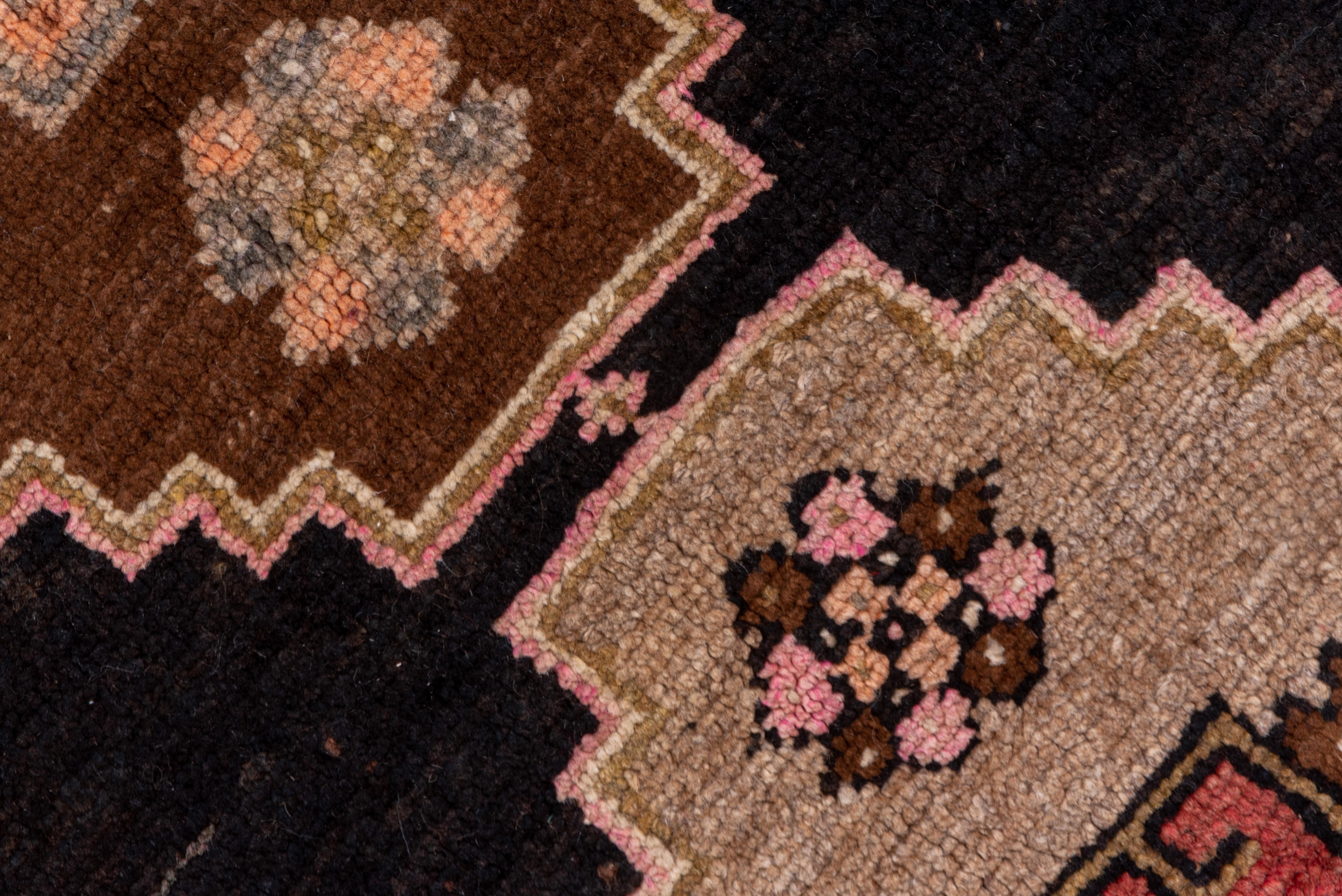 Hand-Knotted Antique Kars Rug, Black Field with Animal Motifs and People Motifs, Pink Accents For Sale