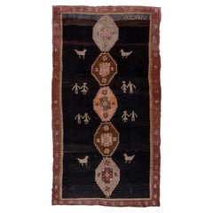 Antique Kars Rug, Black Field with Animal Motifs and People Motifs, Pink Accents