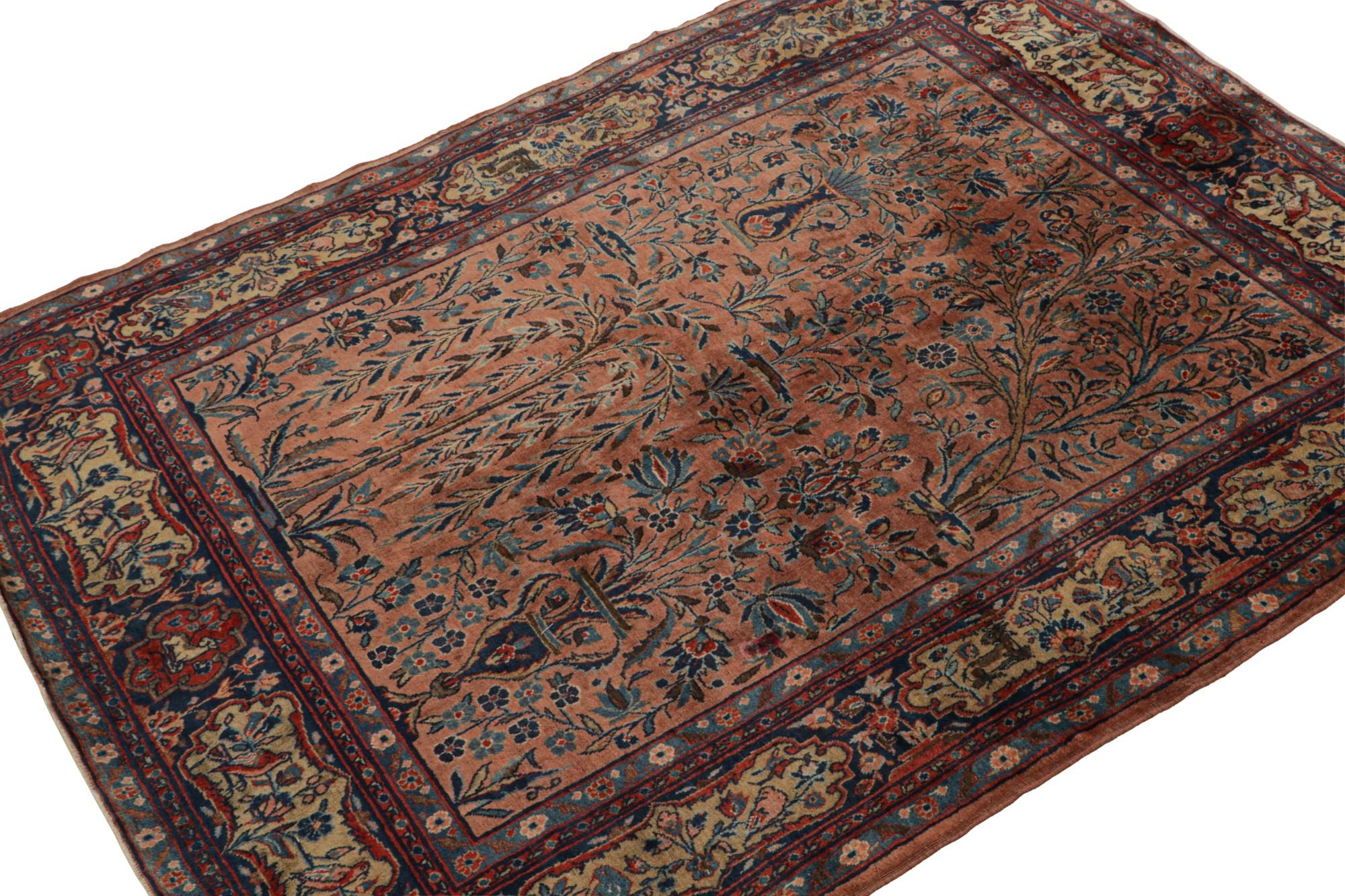 Hand-knotted in wool, this 4x5 antique Persian Kashan rug features a rare design with floral patterns, cartouches in the border and pictorials in an asymmetric field style. 

On the Design: 

Admirers of the craft will appreciate this masterpiece as