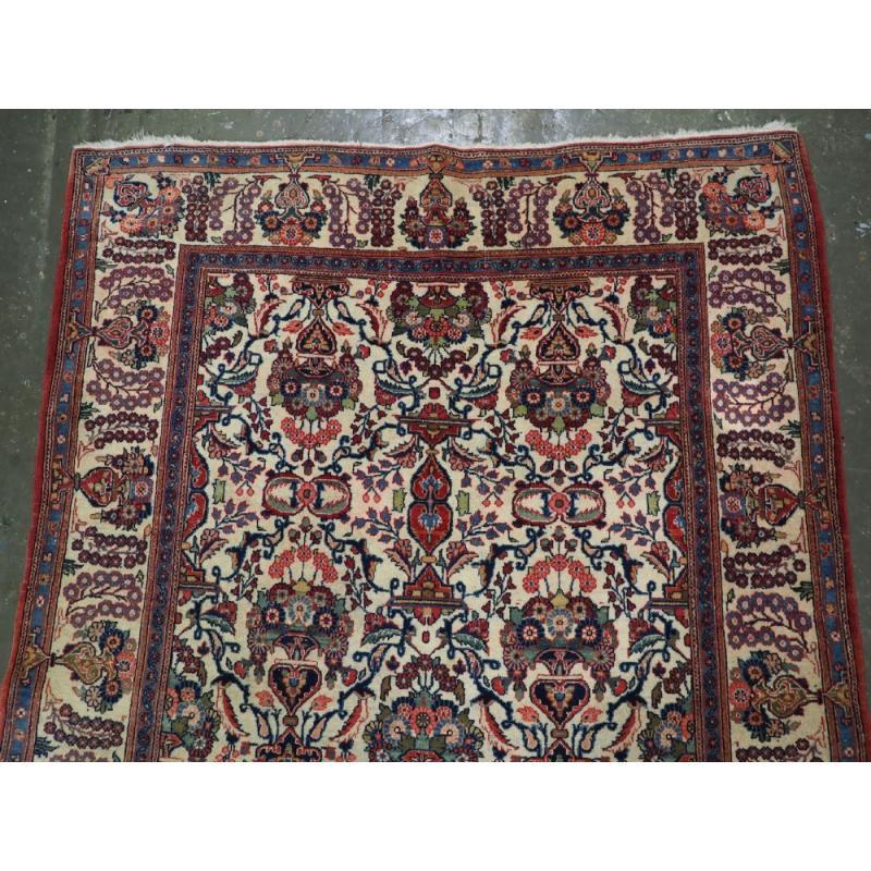 Asiatique Tapis Kashan ancien avec motif de fleurs et de vase, vers 1920 en vente