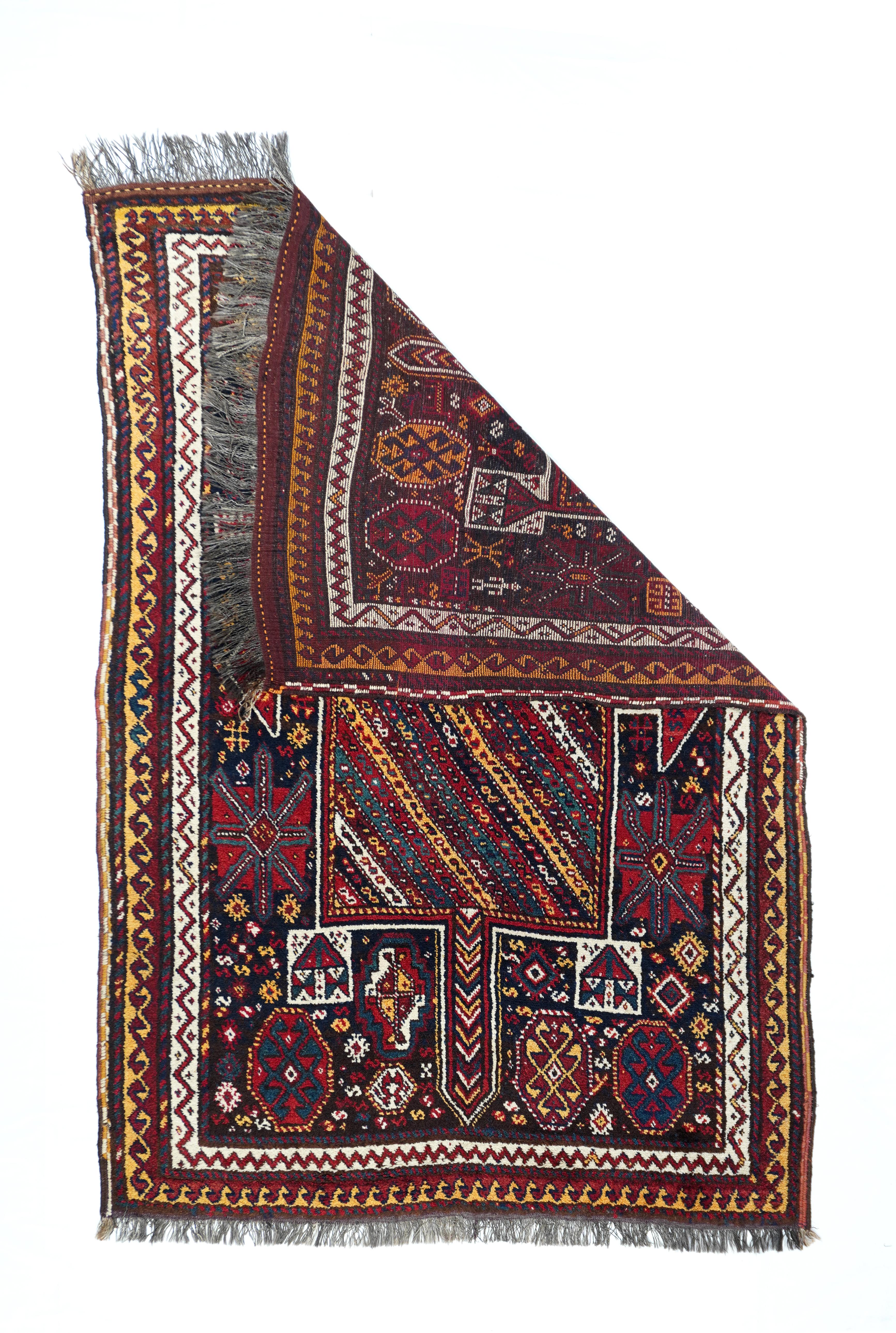 Antique Kashkai Shiraz Rug 4'8'' x 7'. This rare NE Persian tribal scatter shows a rectangular, upright 