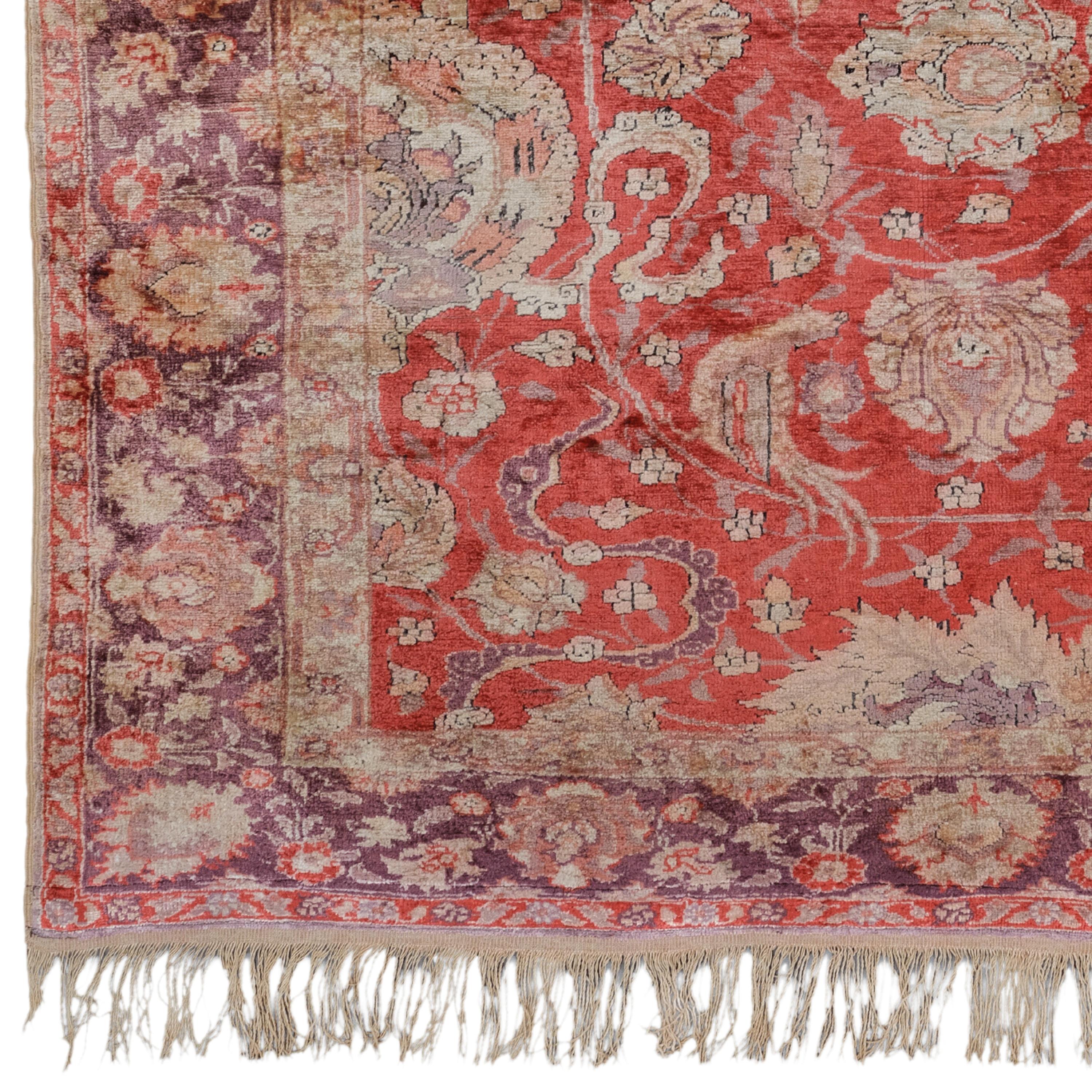 Late 19th Century Anatolian Silk Rug

Hand knotted in Turkey between 1880-1890, this antique Kayseri Silk Rug enjoys a spacious but inviting toothed guard design, complemented by tasseled fringes highlighting the finesse of the inner pattern and its